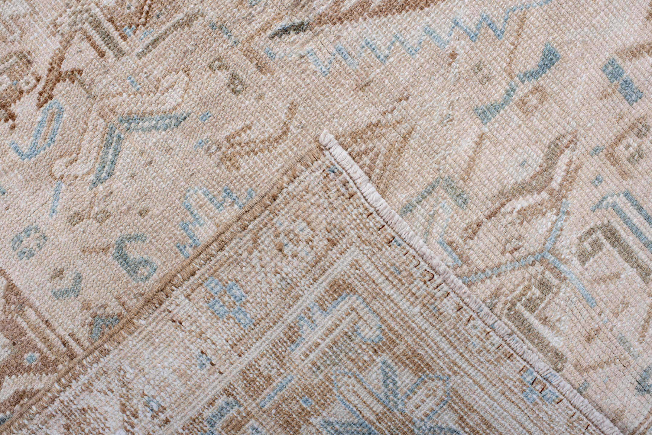 7' x 8' one-of-a-kind handmade antique Heriz rug. Color palette: ivory, camel, pale blue, taupe, beige, light brown