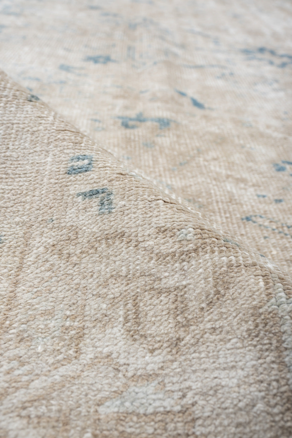 7' x 10' one-of-a-kind handmade vintage Heriz large size rug. Color palette: ivory, pale blue, taupe, beige, light gray