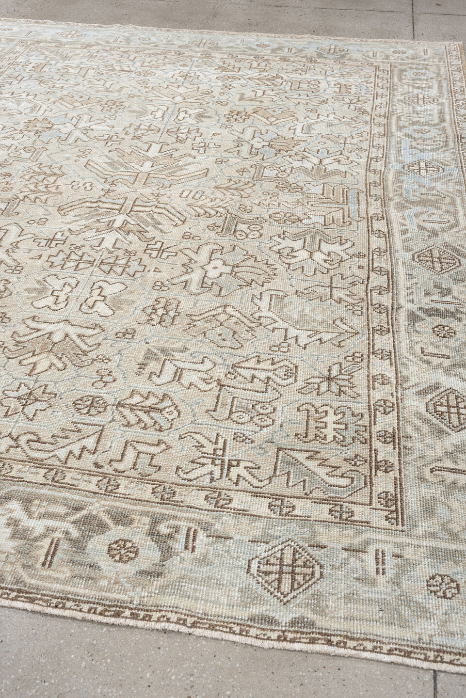 7' x 8' one-of-a-kind handmade vintage Heriz rug. Color palette: ivory, pale blue, taupe, beige, light gray, camel