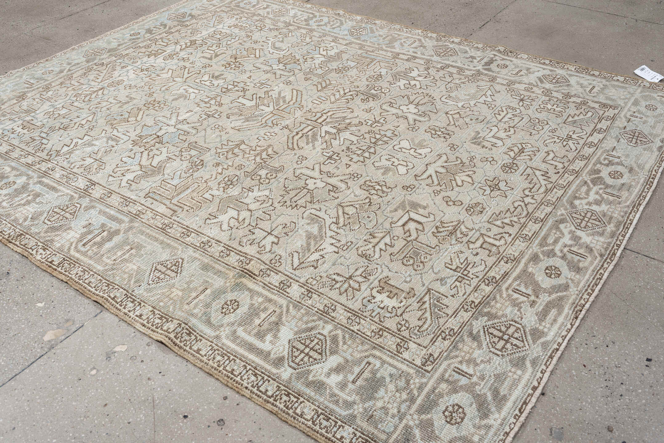 7' x 8' one-of-a-kind handmade vintage Heriz rug. Color palette: ivory, pale blue, taupe, beige, light gray, camel