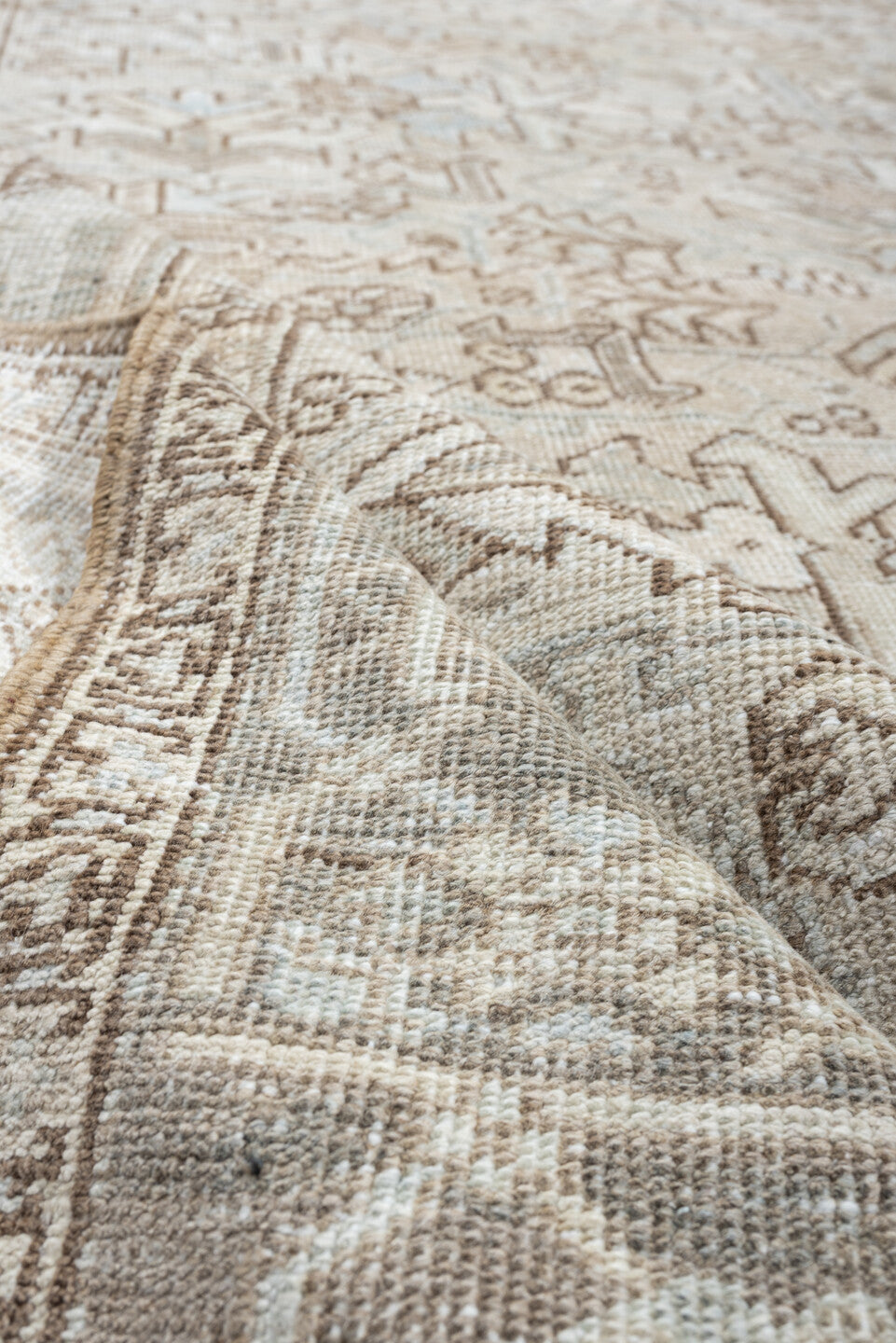 7' x 8' one-of-a-kind handmade vintage Heriz rug. Color palette: ivory, pale blue, taupe, beige, light gray, camel