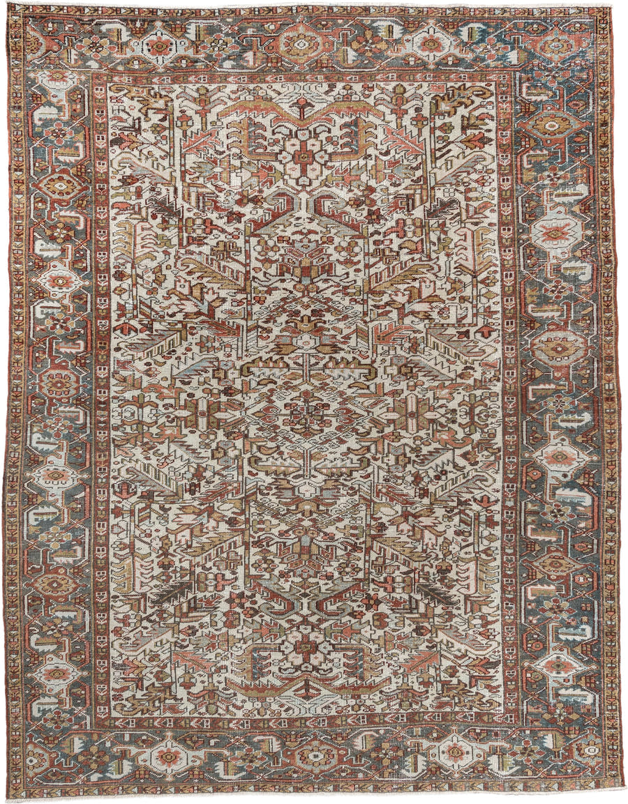 7' x 9' one-of-a-kind handmade vintage Heriz rug. Color palette: ivory, blue gray, rust, camel, sage, terracotta, taupe