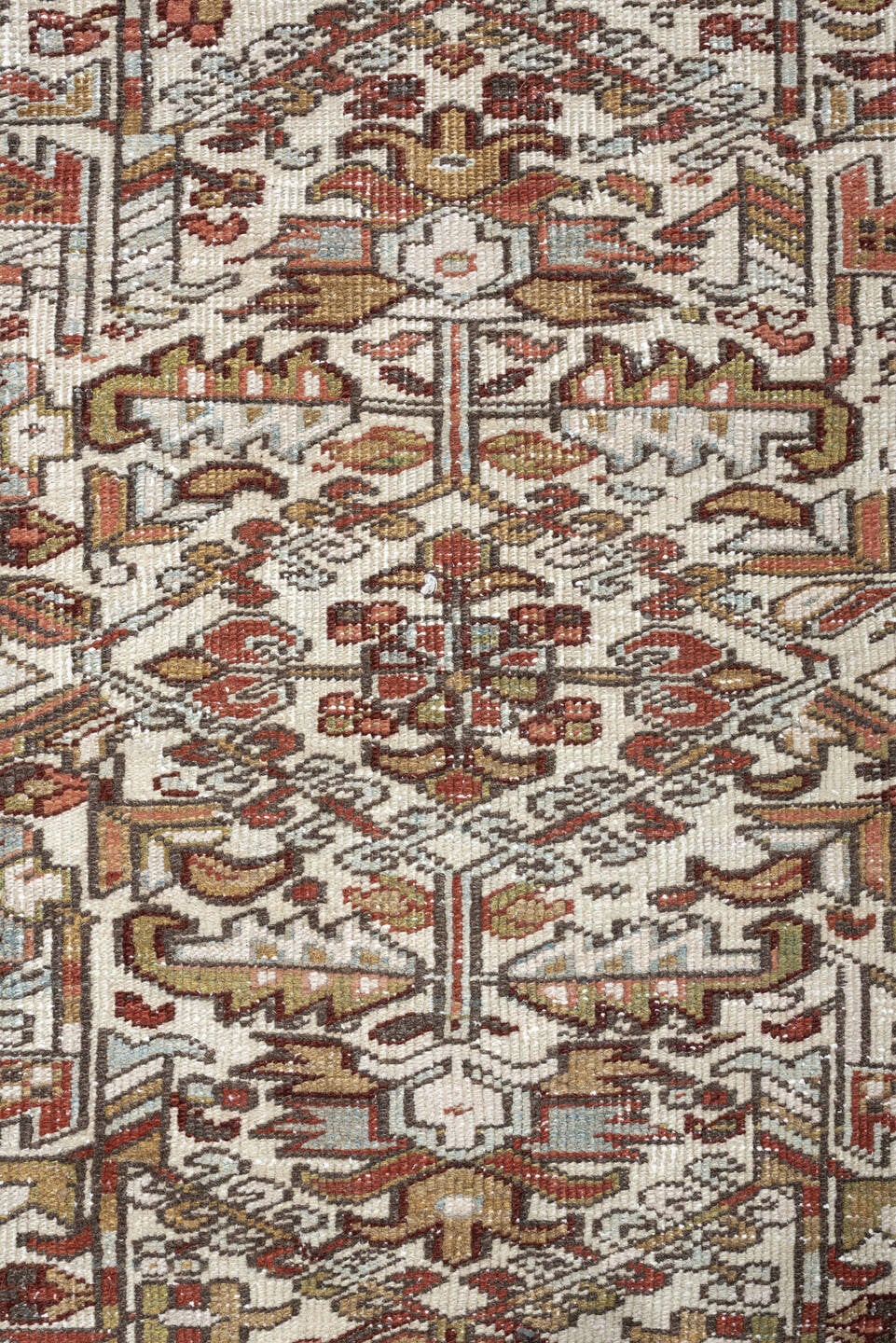 7' x 9' one-of-a-kind handmade vintage Heriz rug. Color palette: ivory, blue gray, rust, camel, sage, terracotta, taupe