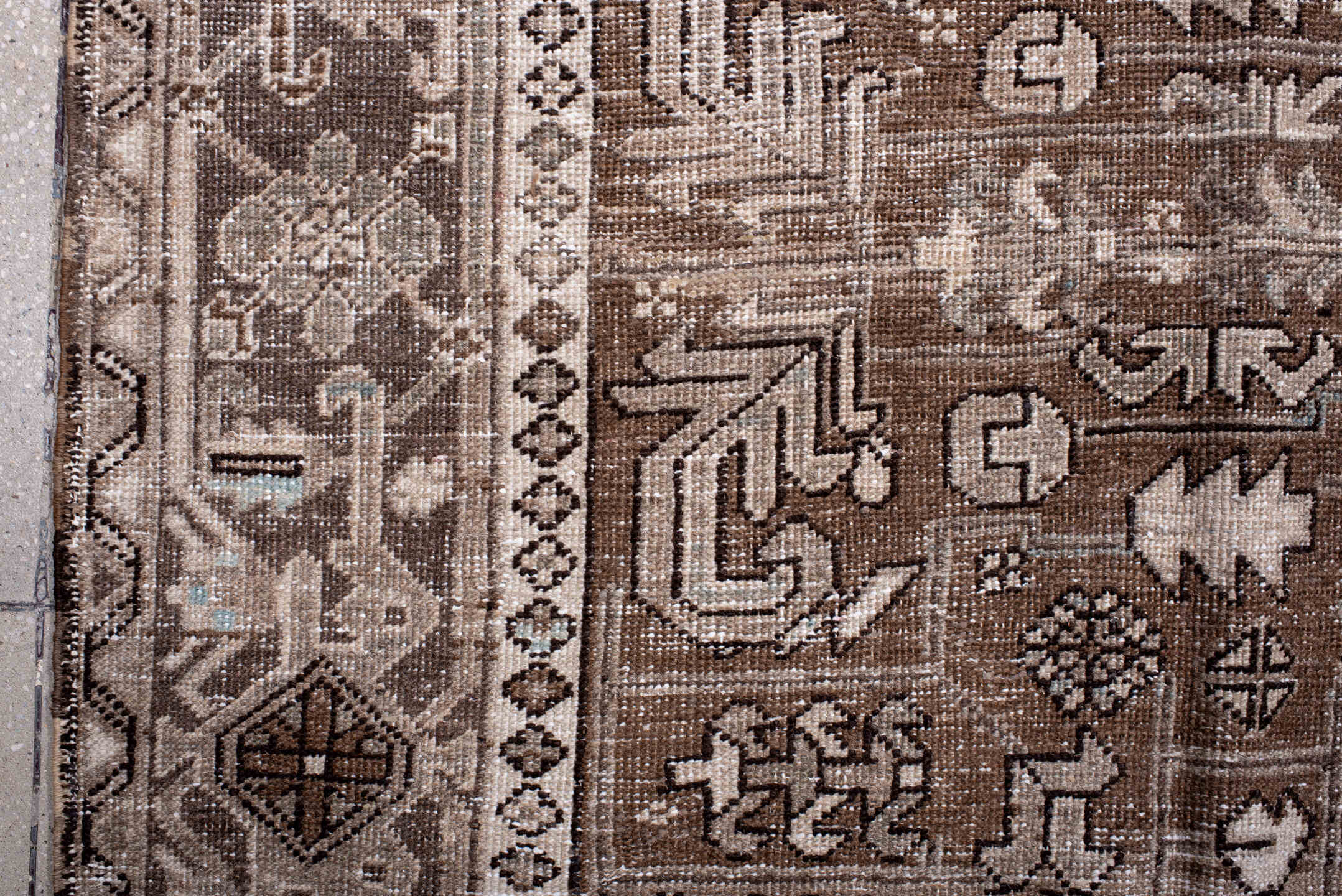 7' x 10' one-of-a-kind handmade antique Heriz large size rug. Color palette: brown, taupe, ivory, camel, slate, pale blue