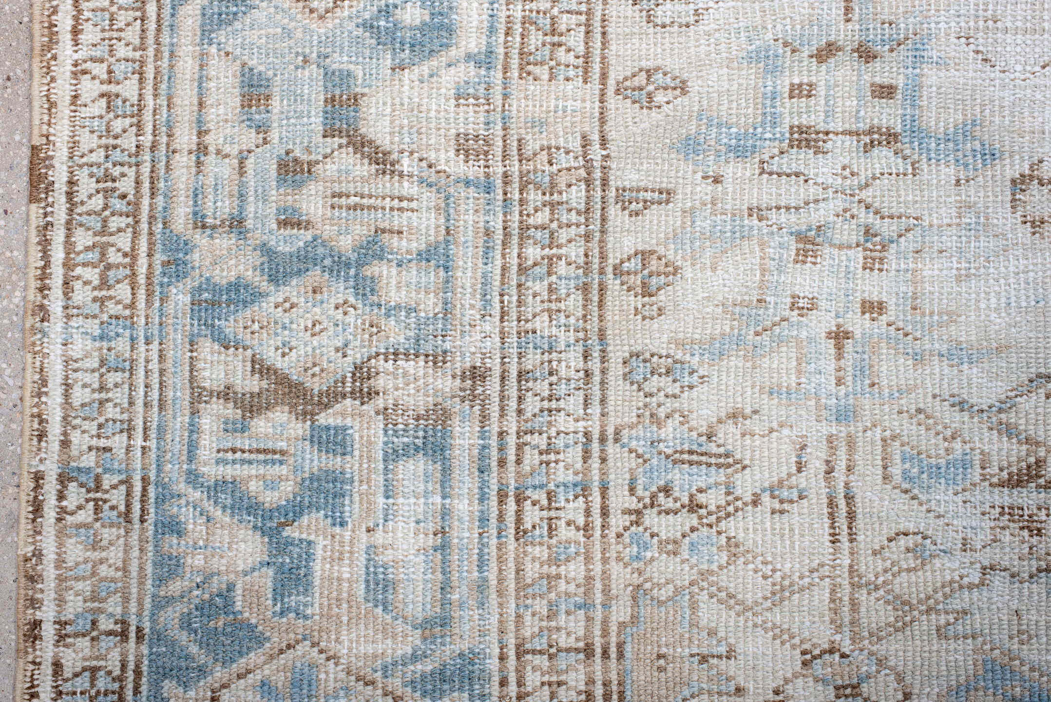 7' x 10' one-of-a-kind handmade antique Heriz large size rug. Color palette: ivory, sky blue, taupe, beige, camel