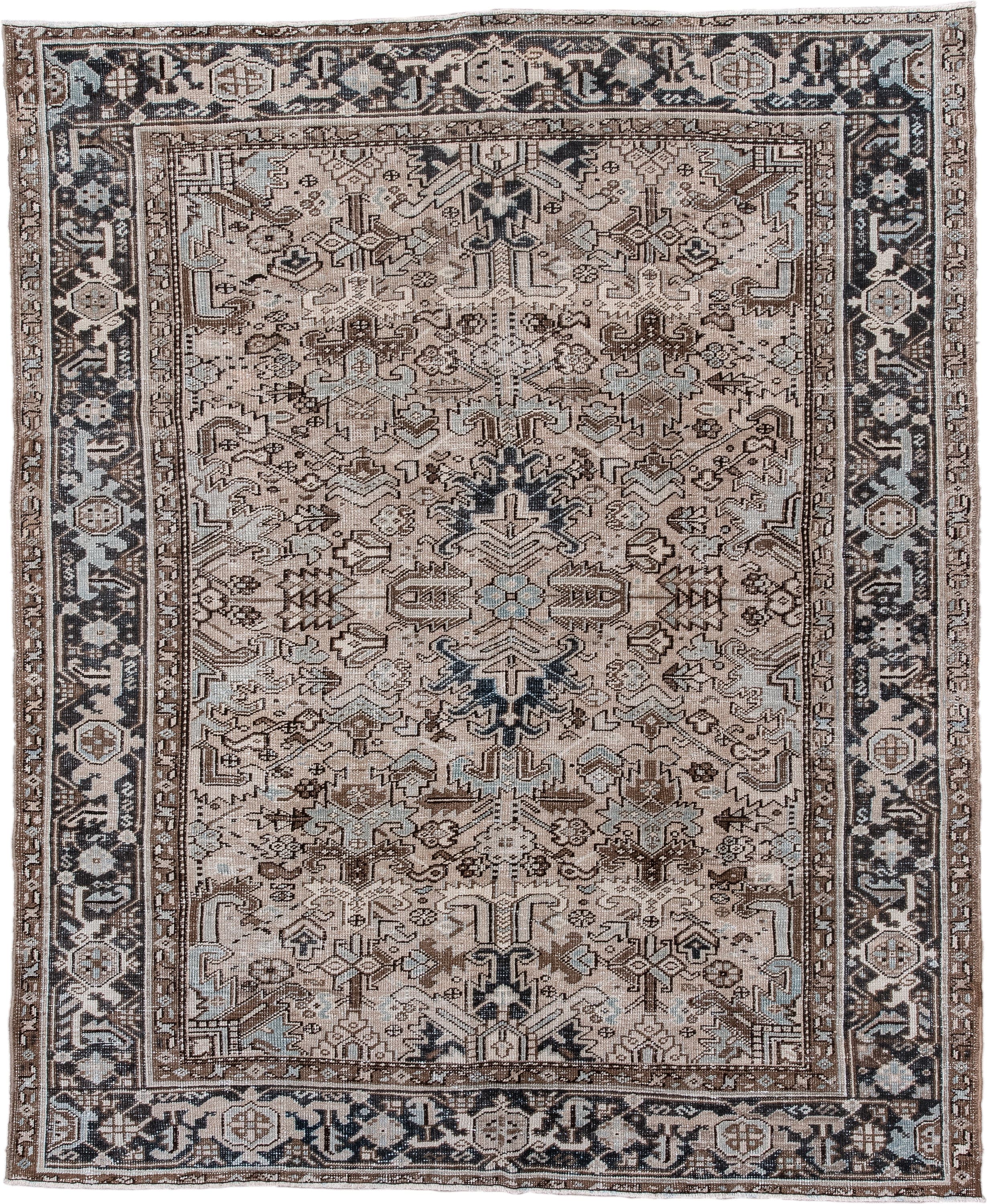 6' x 8' one-of-a-kind handmade vintage Heriz medium size rug. Color palette: ivory, taupe, charcoal, brown, pale blue, camel
