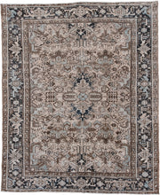 6' x 8' one-of-a-kind handmade vintage Heriz medium size rug. Color palette: ivory, taupe, charcoal, brown, pale blue, camel