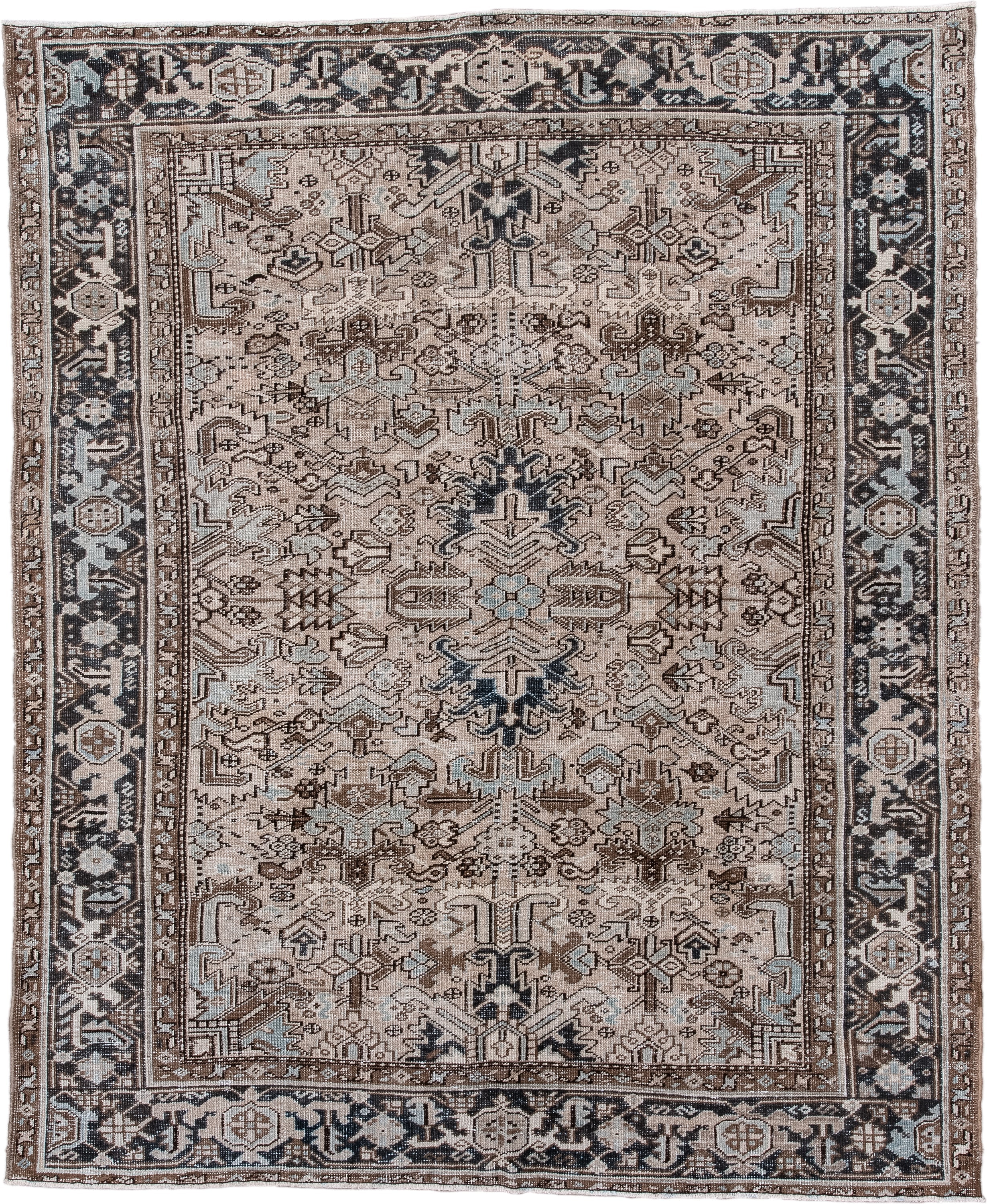 6' x 8' one-of-a-kind handmade vintage Heriz medium size rug. Color palette: ivory, taupe, charcoal, brown, pale blue, camel