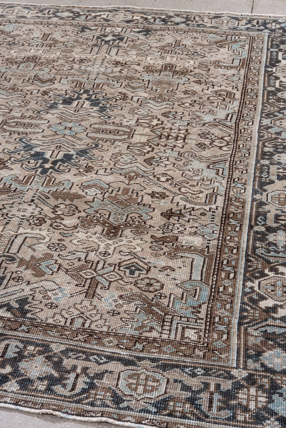 6' x 8' one-of-a-kind handmade vintage Heriz medium size rug. Color palette: ivory, taupe, charcoal, brown, pale blue, camel