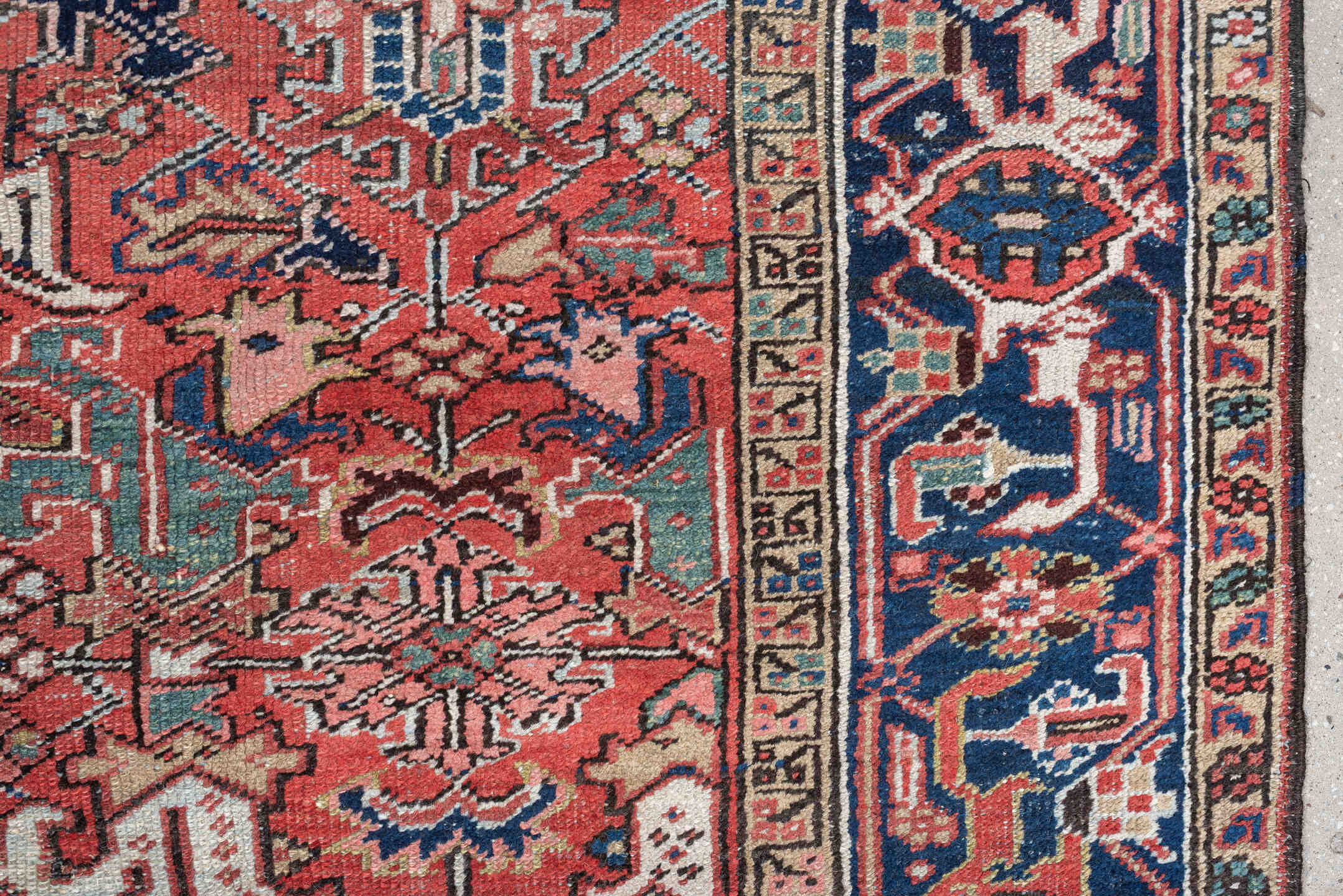 7' x 9' one-of-a-kind handmade vintage Heriz rug. Color palette: terracotta, navy, ivory, sky blue, slate blue, coral, camel