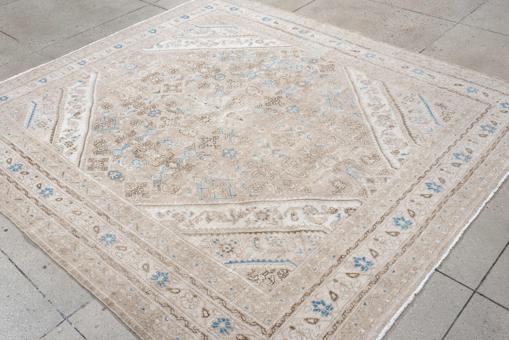 7' x 8' one-of-a-kind handmade antique Bibikabad rug. Color palette: ivory, taupe, sky blue, beige, camel, brown, gray