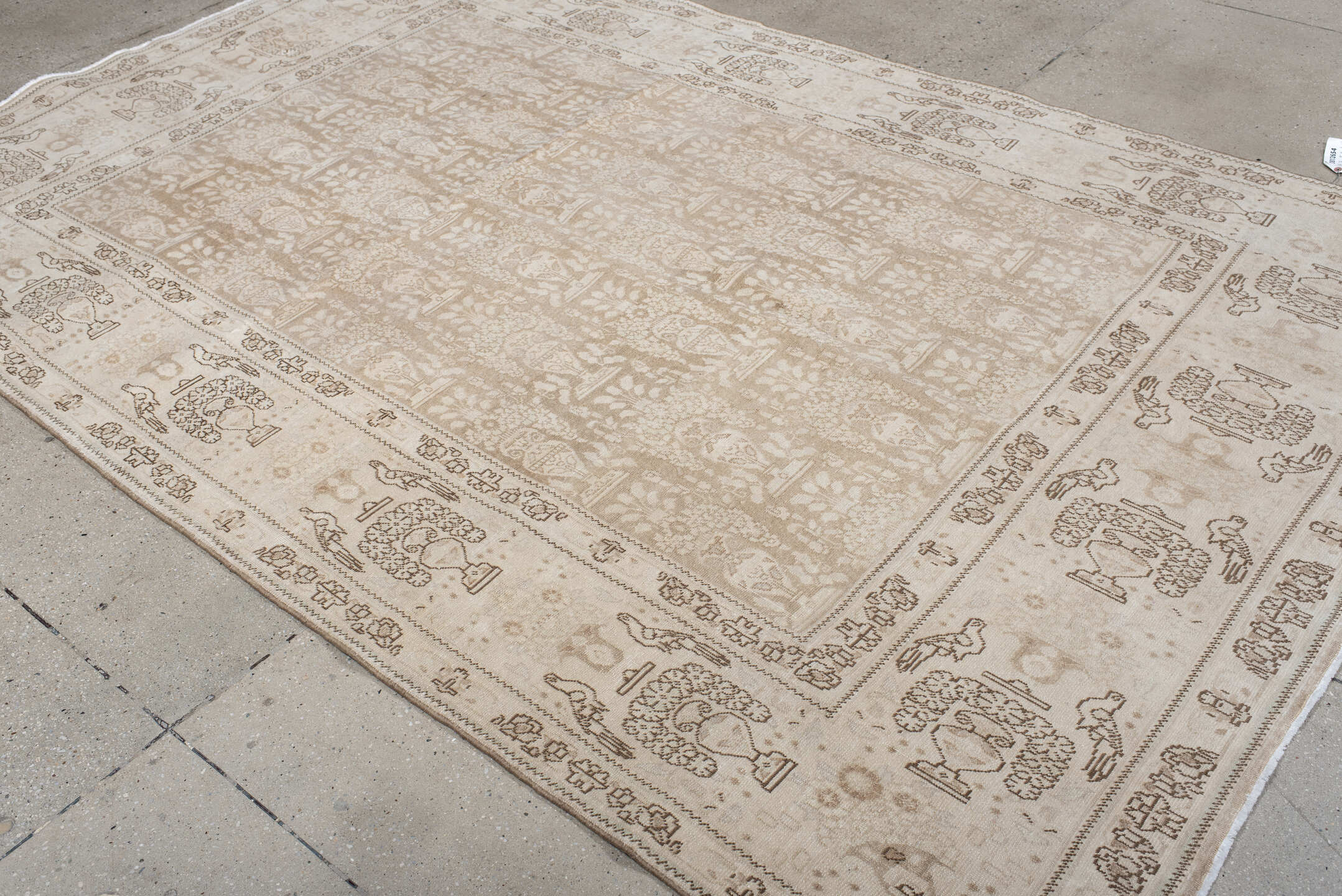 6' x 9' one-of-a-kind handmade antique Tabriz medium size rug. Color palette: ivory, beige, taupe, camel, brown, gray