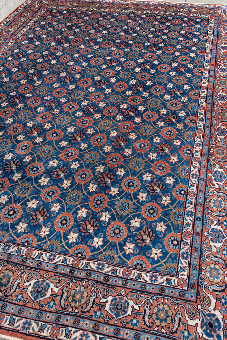 7' x 11' one-of-a-kind handmade antique Varamin large size rug. Color palette: blue, ivory, rust, navy, coral, teal