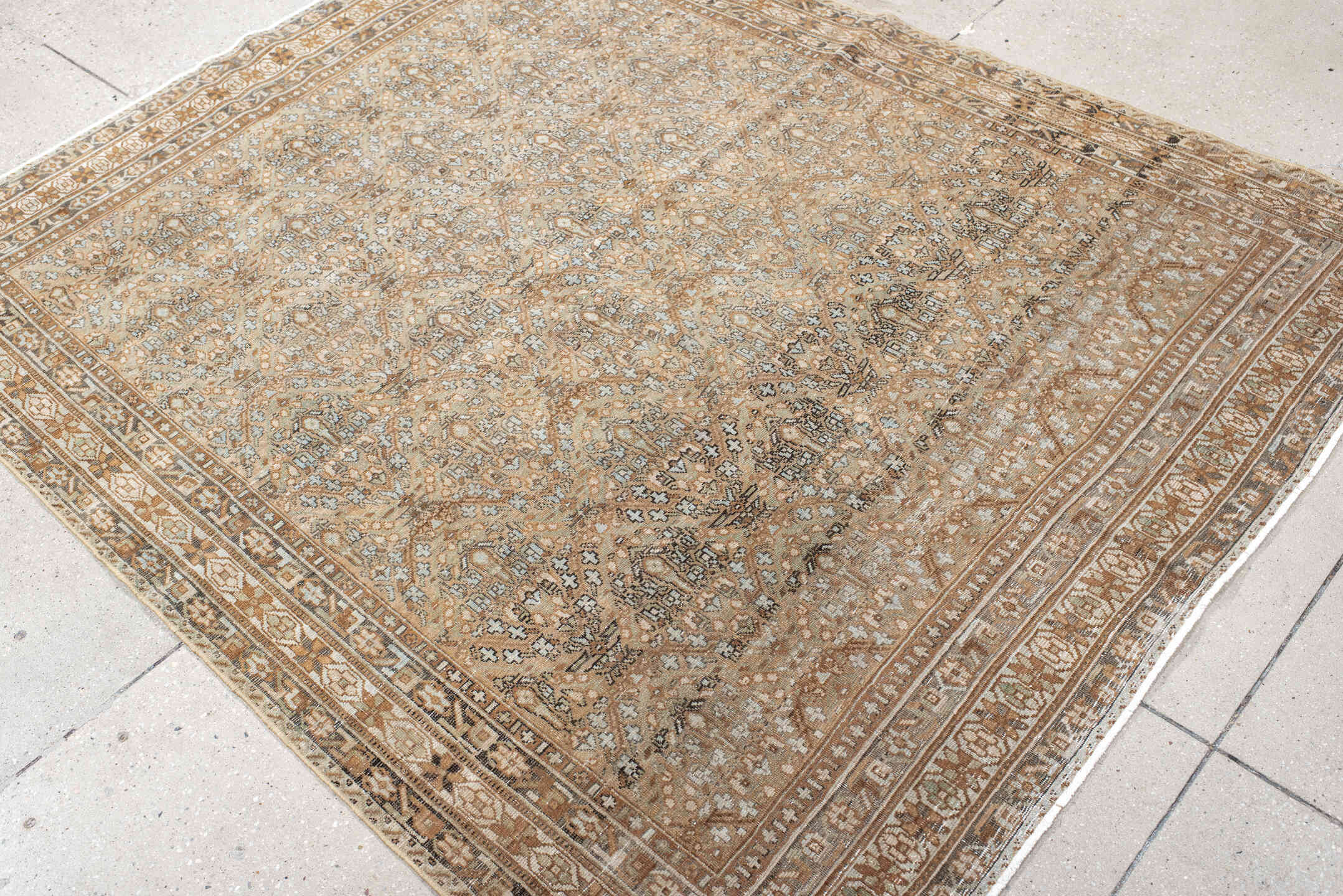 5' x 6' one-of-a-kind handmade antique Afshar rug. Color palette: camel, ivory, rust, taupe, slate, brown, beige, terracotta