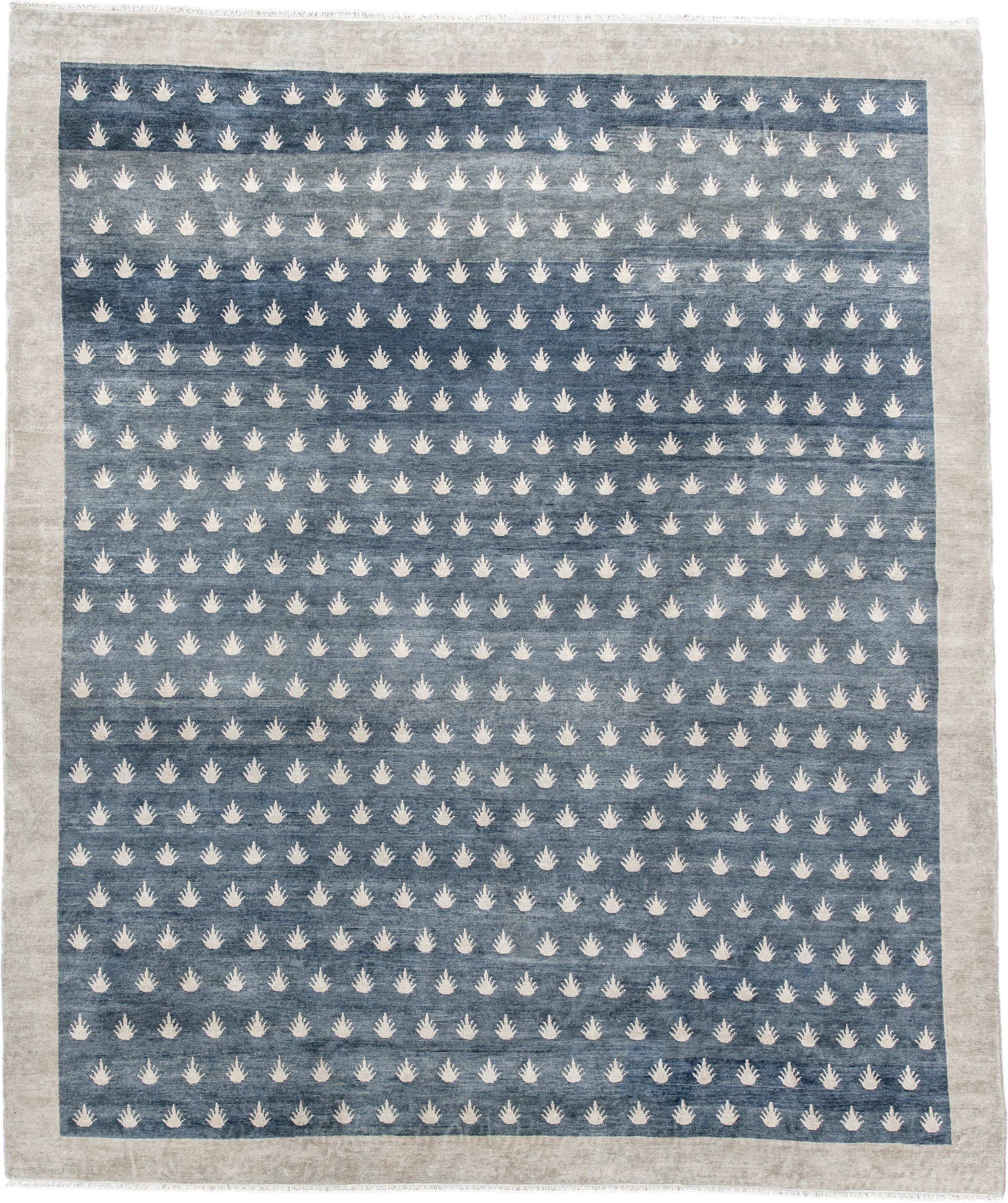 7' x 9' one-of-a-kind handmade vintage Tibetan rug. Color palette: blue, ivory, cream, taupe, gray, beige