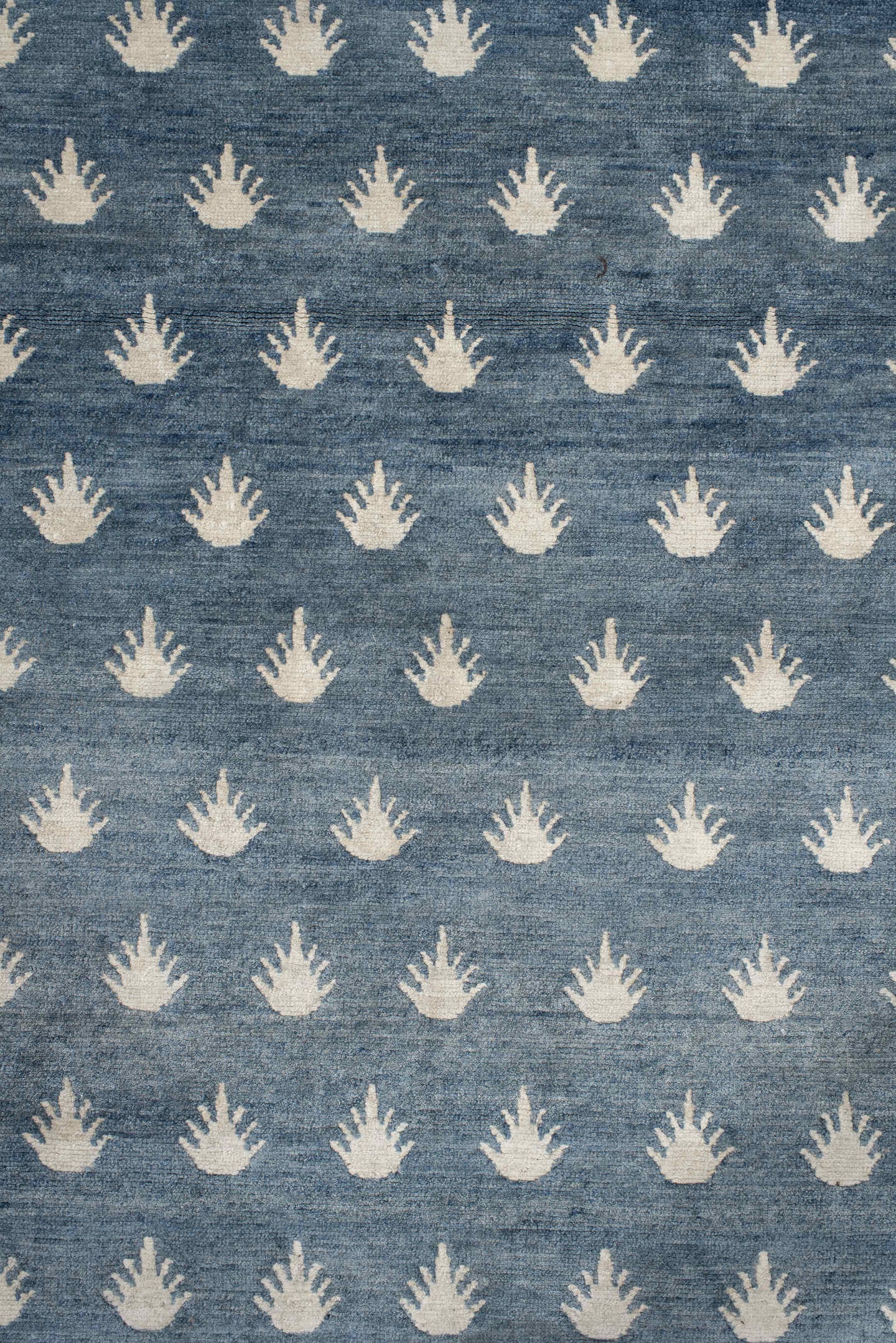 7' x 9' one-of-a-kind handmade vintage Tibetan rug. Color palette: blue, ivory, cream, taupe, gray, beige