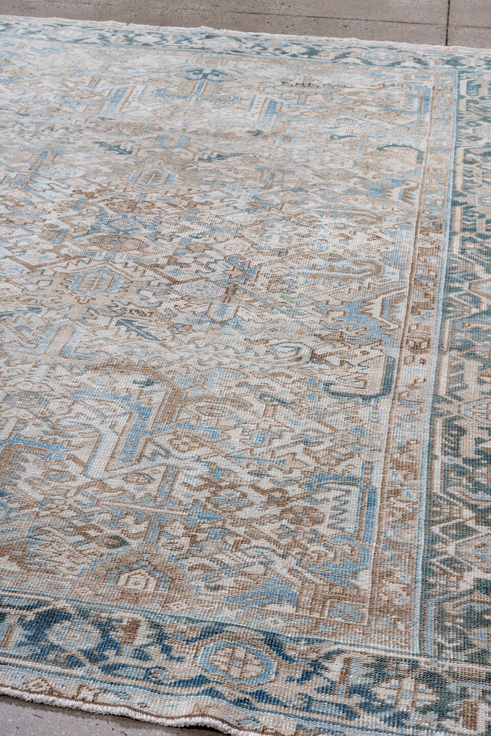 6' x 8' one-of-a-kind handmade vintage Heriz rug. Color palette: ivory, pale blue, taupe, slate, cream, beige, light blue