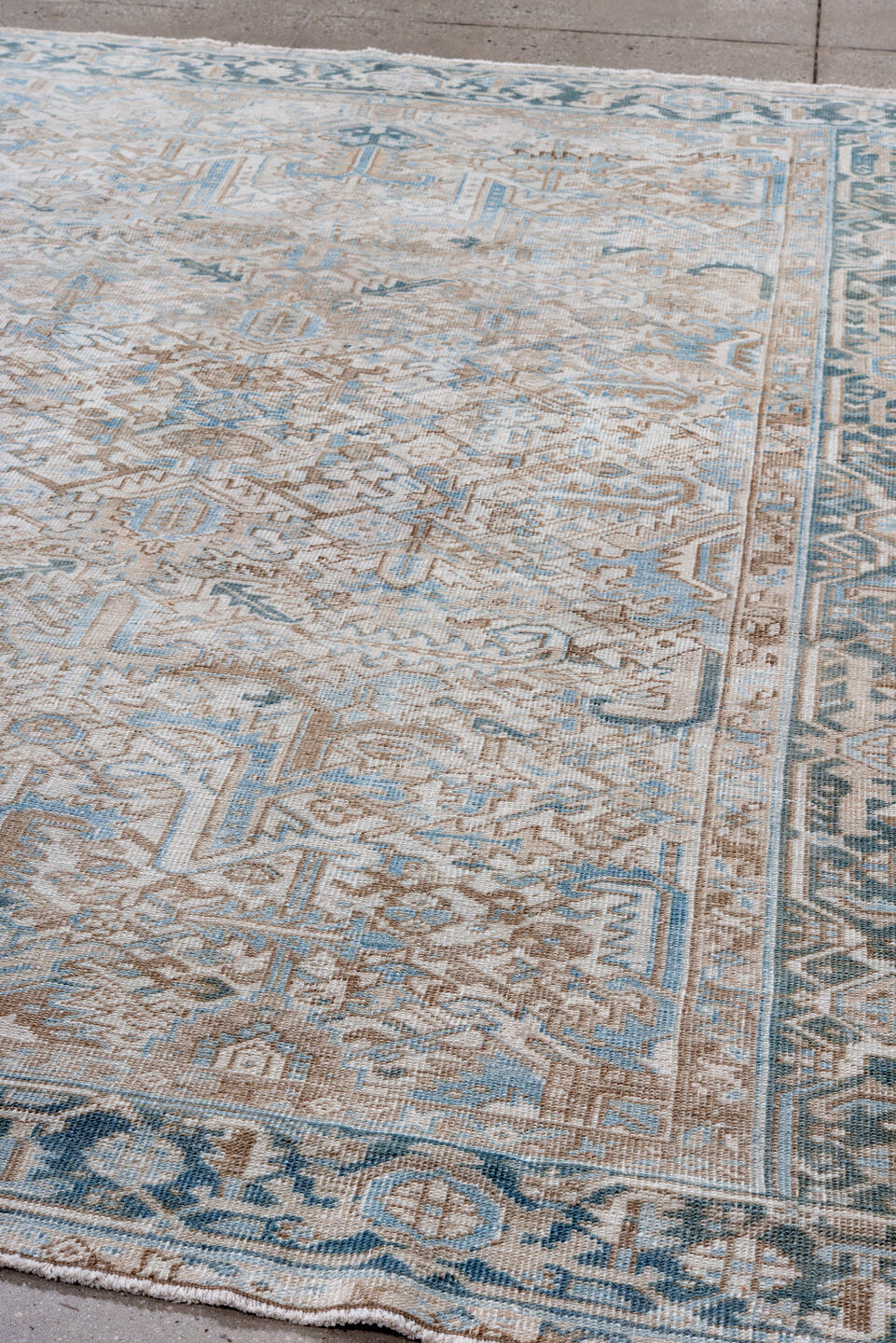 6' x 8' one-of-a-kind handmade vintage Heriz rug. Color palette: ivory, pale blue, taupe, slate, cream, beige, light blue