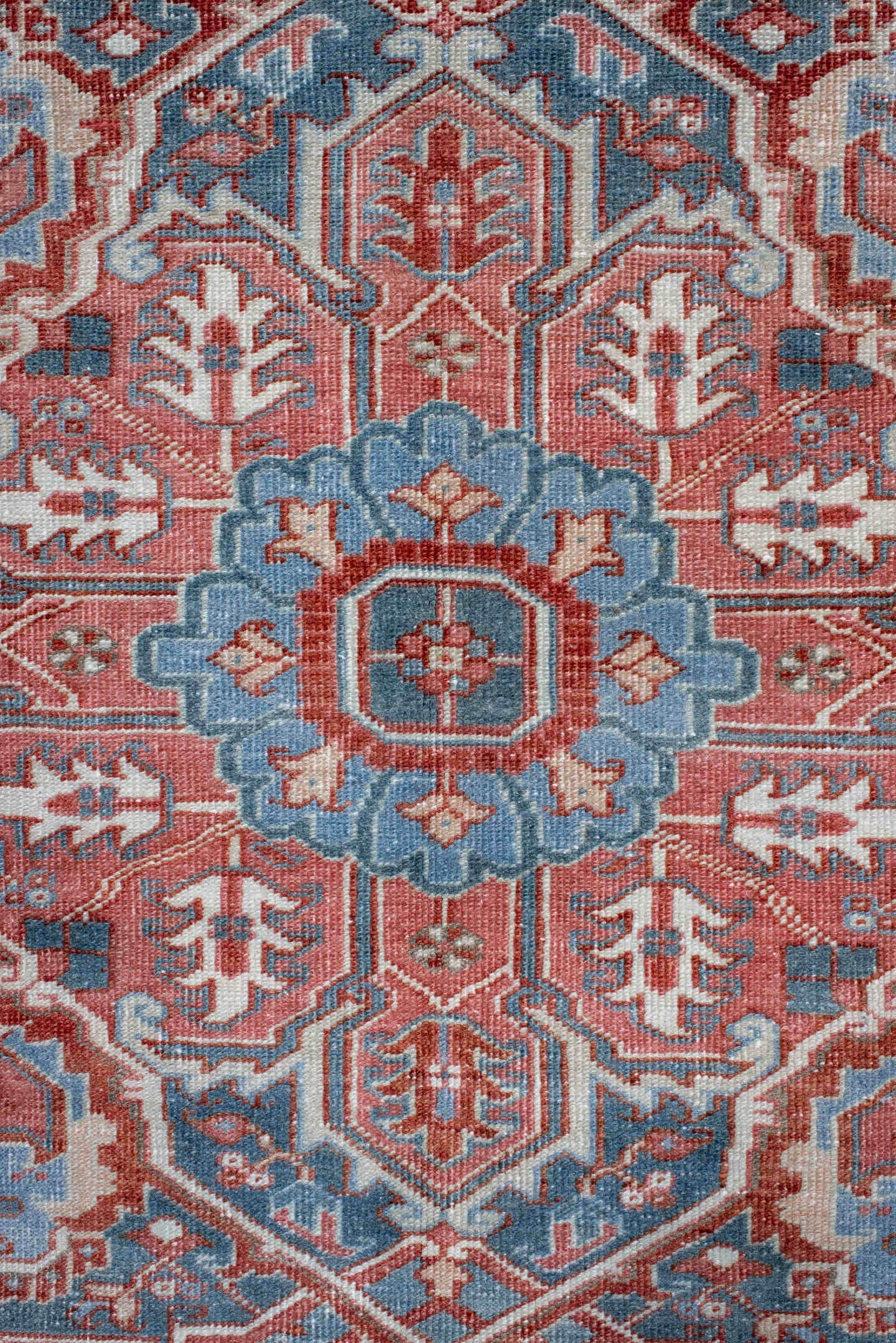 8' x 11' one-of-a-kind handmade antique Heriz large size rug. Color palette: ivory, sky blue, rust, terra cotta, brick