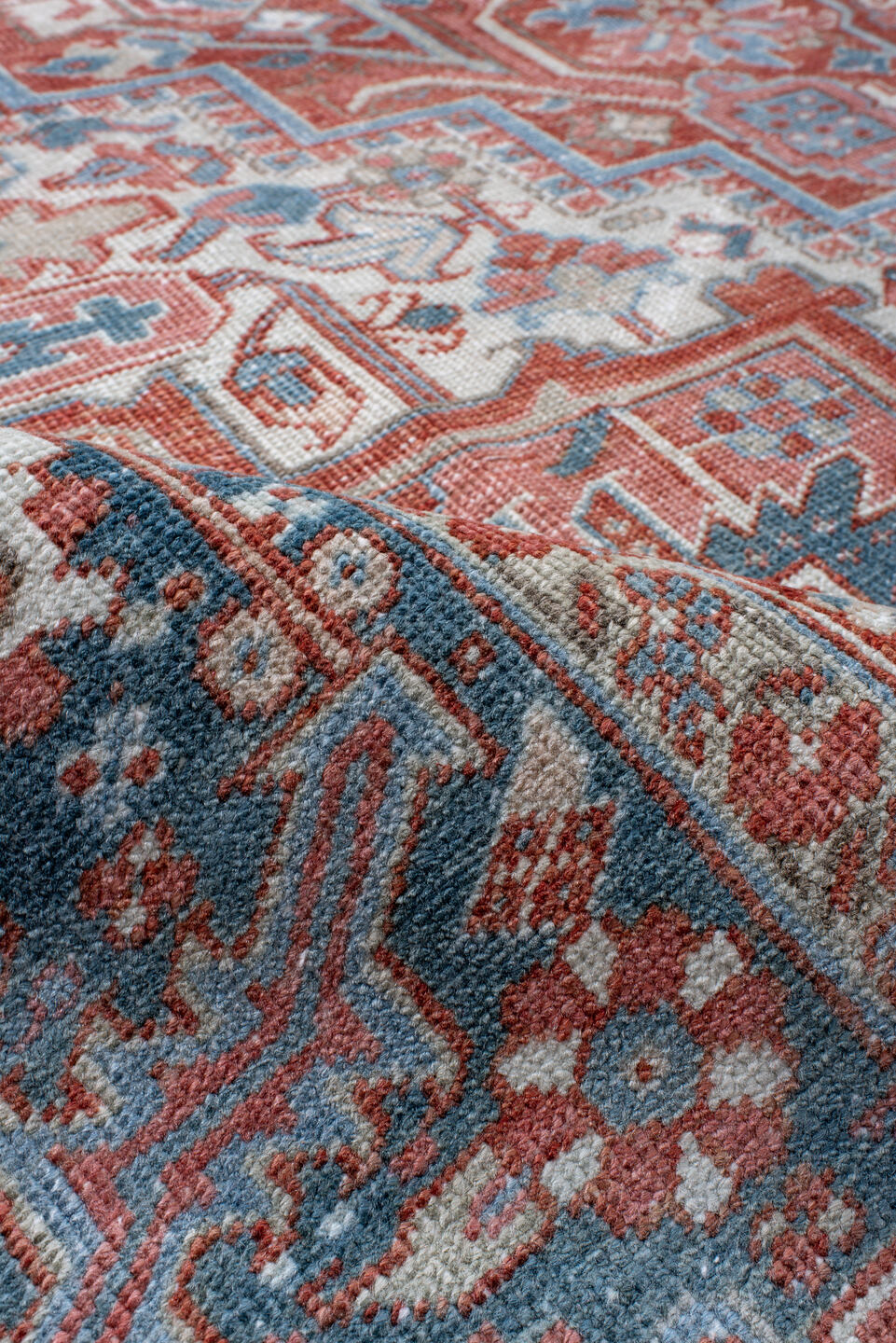 8' x 11' one-of-a-kind handmade antique Heriz large size rug. Color palette: ivory, sky blue, rust, terra cotta, brick