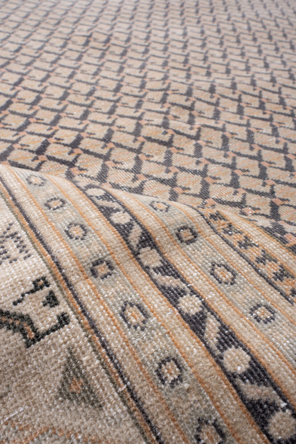 8' x 11' one-of-a-kind handmade vintage Saraband large size rug. Color palette: taupe, ivory, charcoal, camel, brown, beige