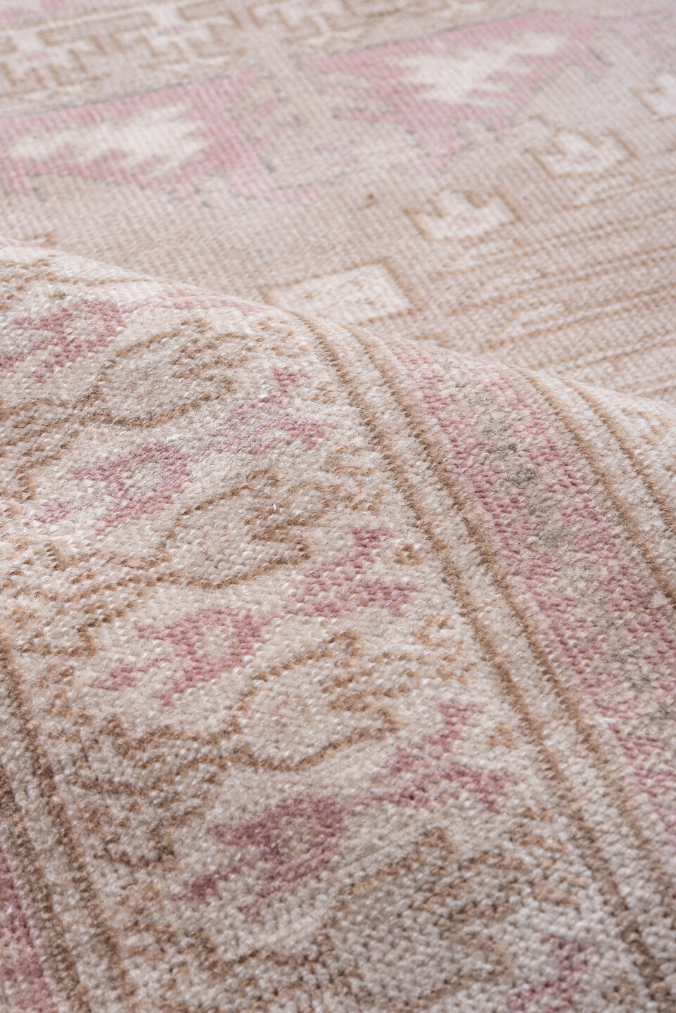 5' x 8' one-of-a-kind handmade vintage Sivas medium size rug. Color palette: gray, light gray, linen, off-white, pink