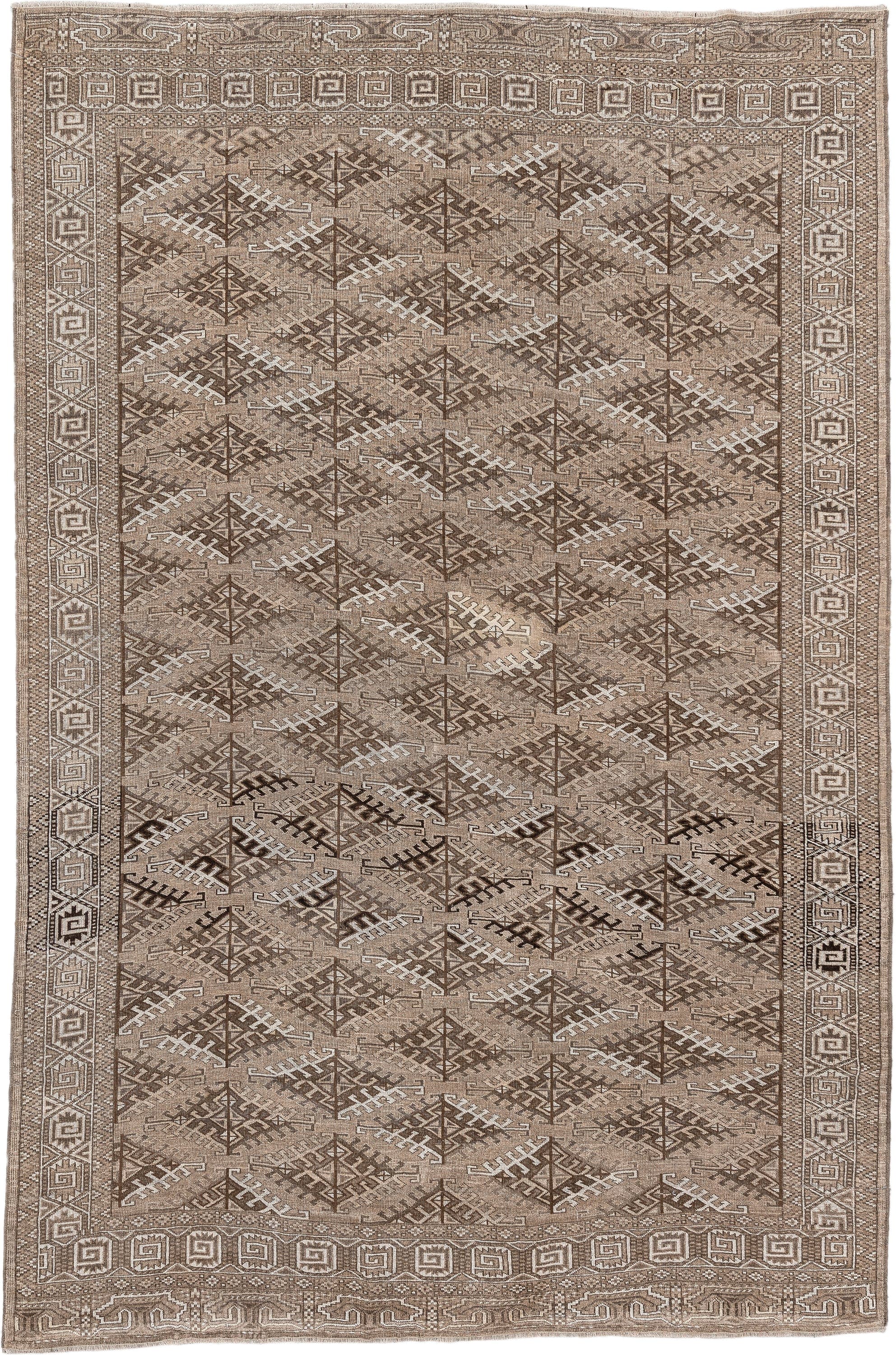 6' x 9' one-of-a-kind handmade antique Yamoud large size rug. Color palette: taupe, camel, ivory, brown, sand, charcoal