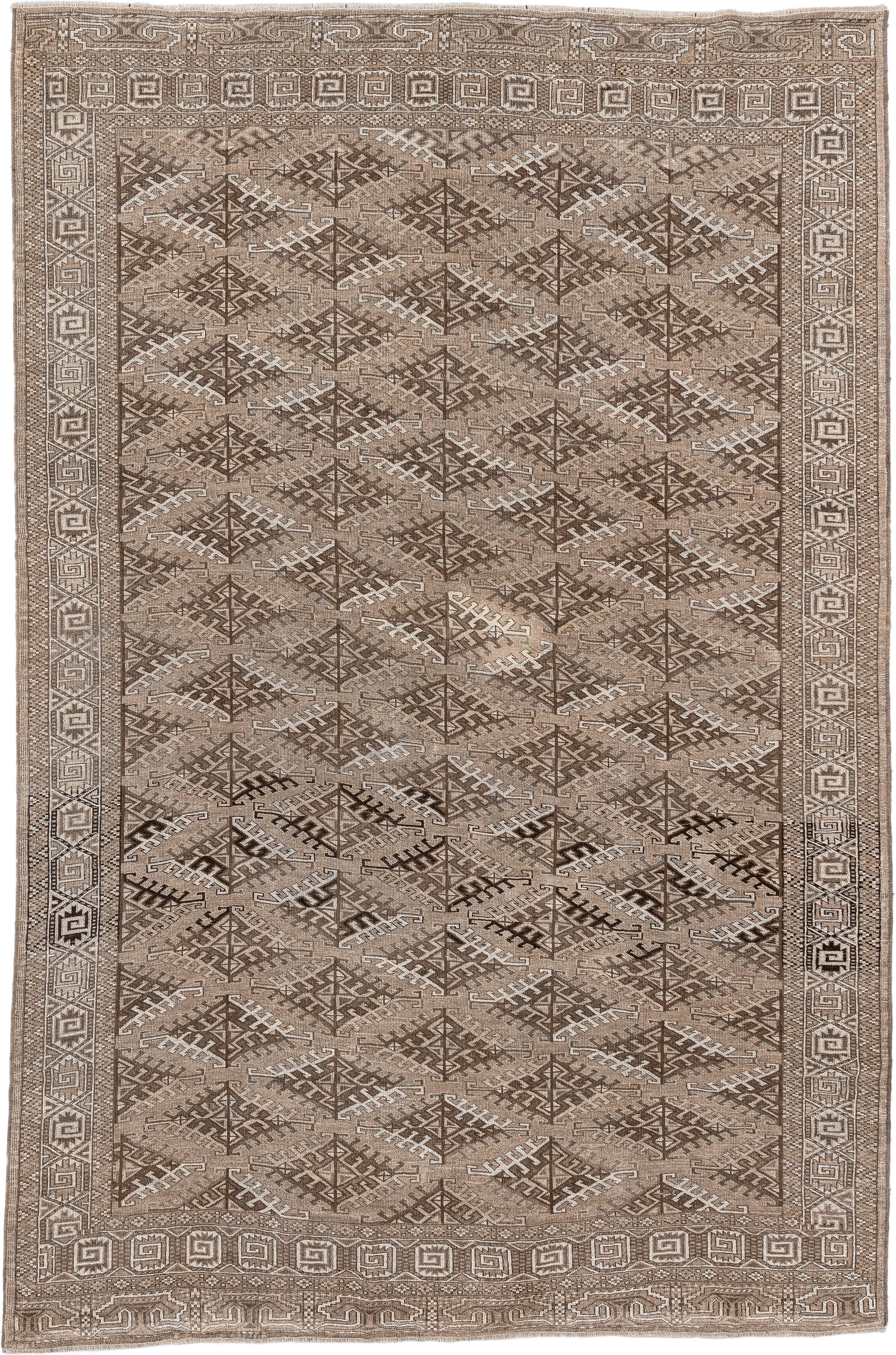 6' x 9' one-of-a-kind handmade antique Yamoud large size rug. Color palette: taupe, camel, ivory, brown, sand, charcoal