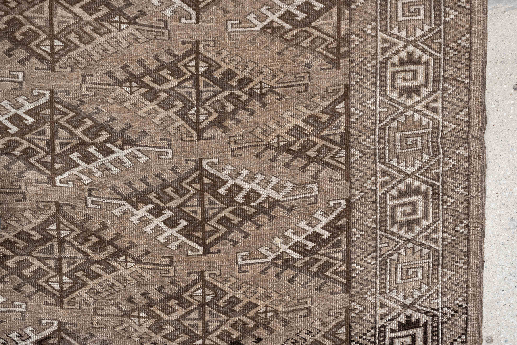 6' x 9' one-of-a-kind handmade antique Yamoud large size rug. Color palette: taupe, camel, ivory, brown, sand, charcoal
