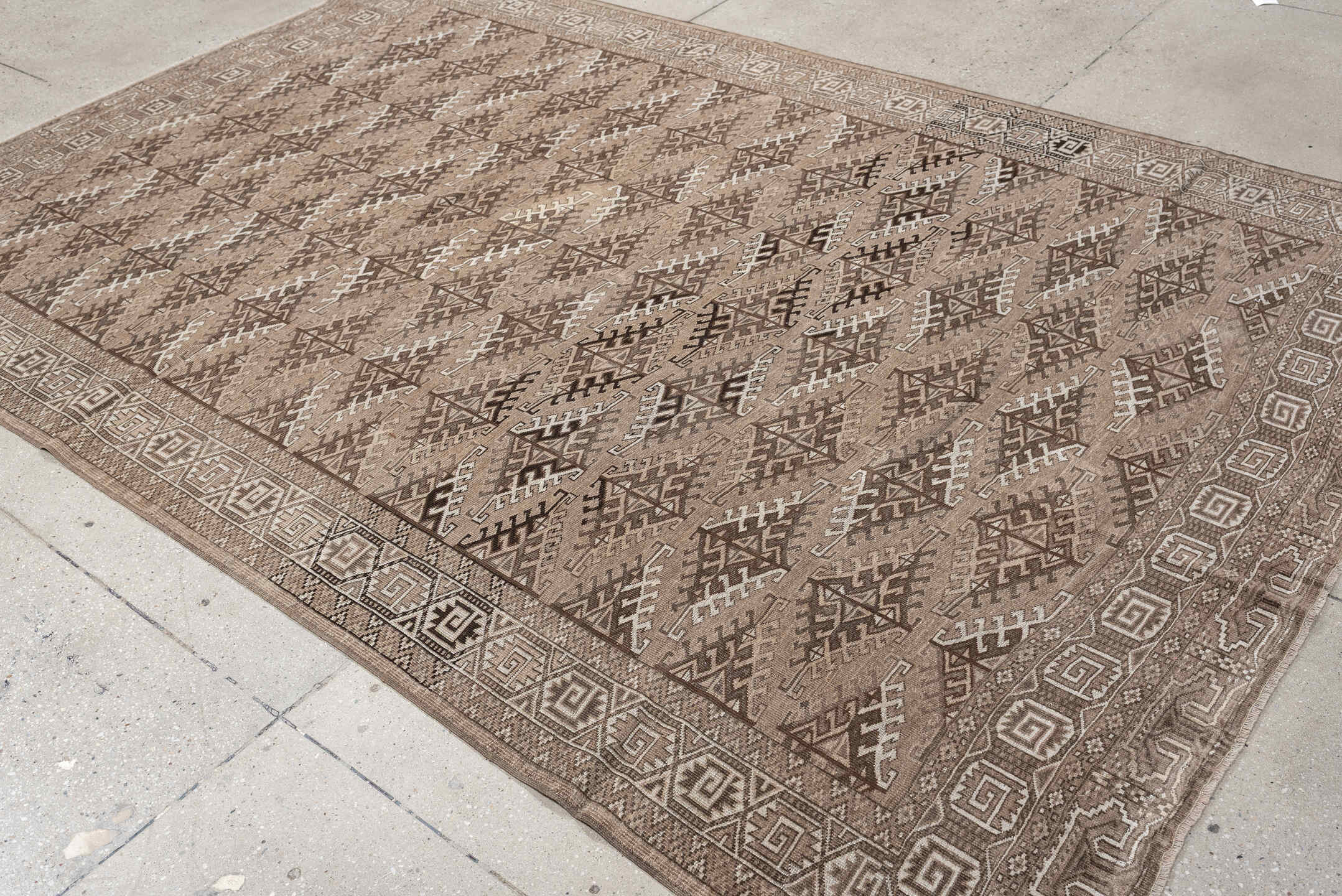 6' x 9' one-of-a-kind handmade antique Yamoud large size rug. Color palette: taupe, camel, ivory, brown, sand, charcoal