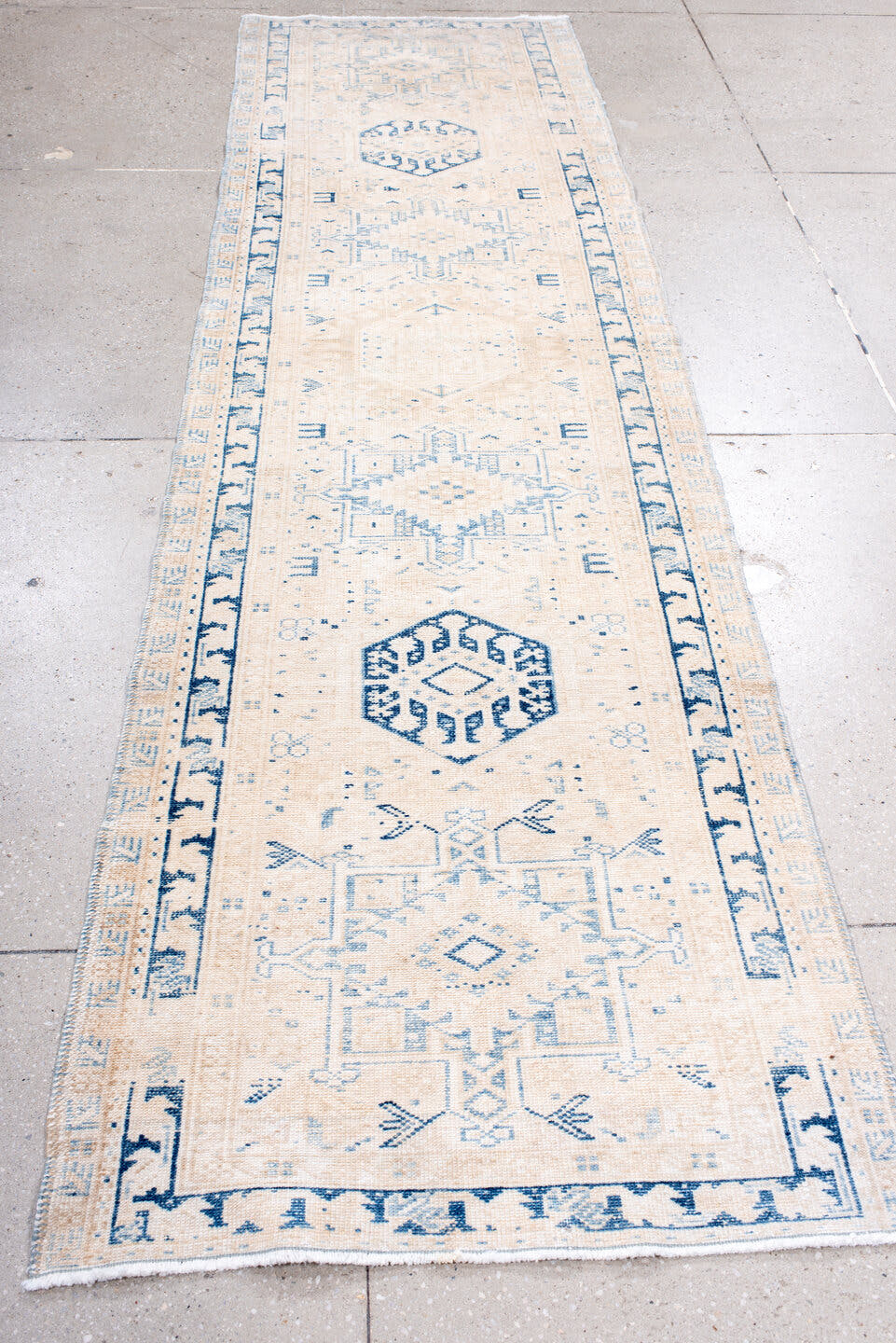 2' x 10' one-of-a-kind handmade antique Karaje runner rug. Color palette: ivory, sky blue, beige, cream, light blue
