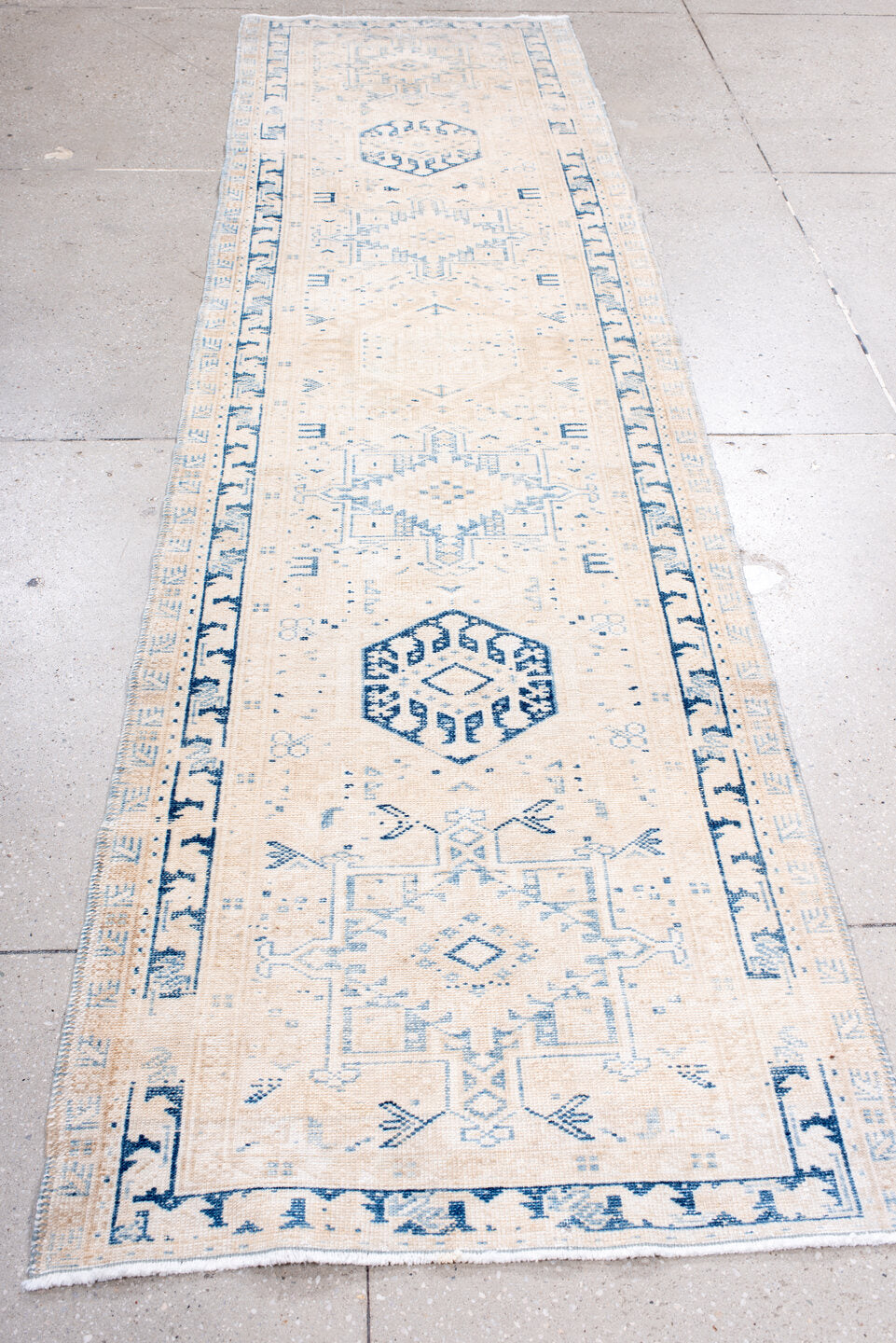 2' x 10' one-of-a-kind handmade antique Karaje runner rug. Color palette: ivory, sky blue, beige, cream, light blue