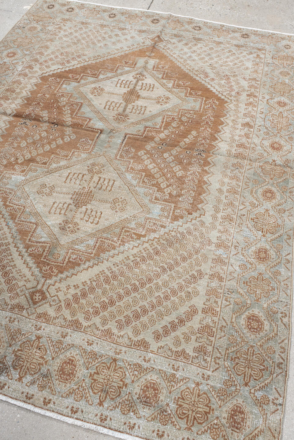 4' x 6' one-of-a-kind handmade vintage Afshar rug. Color palette: ivory, terra cotta, pale blue, taupe, camel, rust