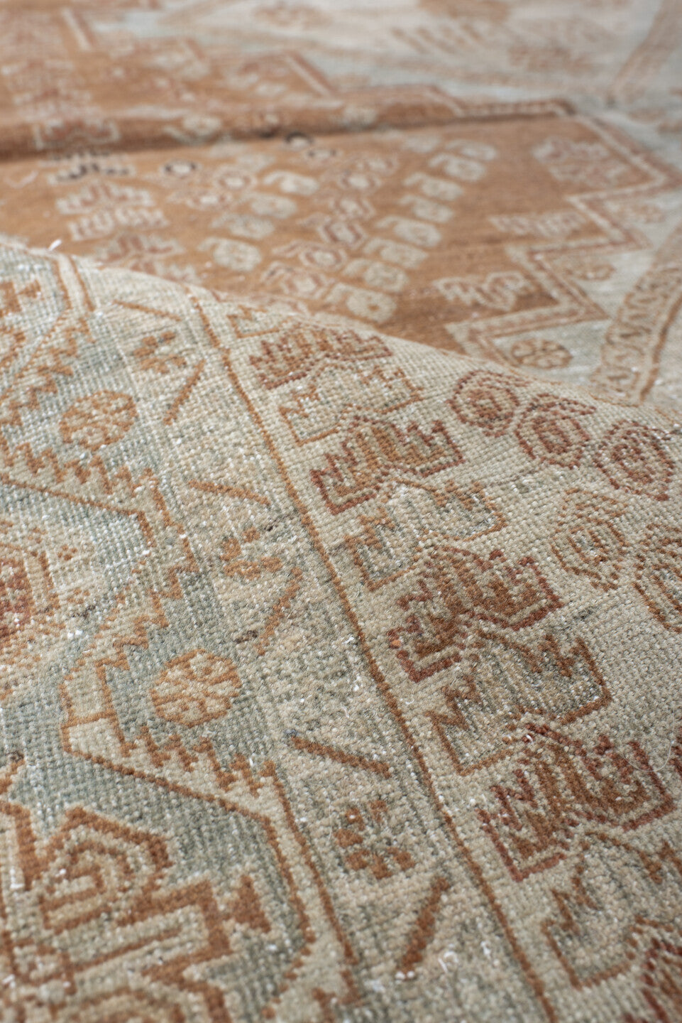 4' x 6' one-of-a-kind handmade vintage Afshar rug. Color palette: ivory, terra cotta, pale blue, taupe, camel, rust