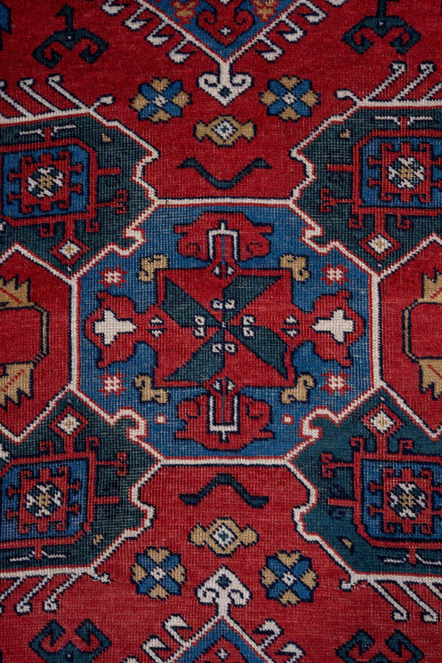 3' x 5' one-of-a-kind handmade vintage Caucasian small size rug. Color palette: red, blue, ivory, navy, teal, gold, crimson