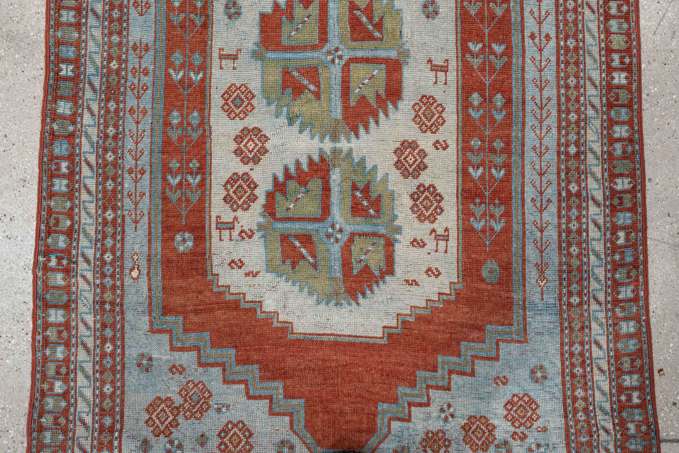4' x 3' one-of-a-kind handmade antique Caucasian rug. Color palette: terracotta, sky blue, ivory, sage, rust, brown
