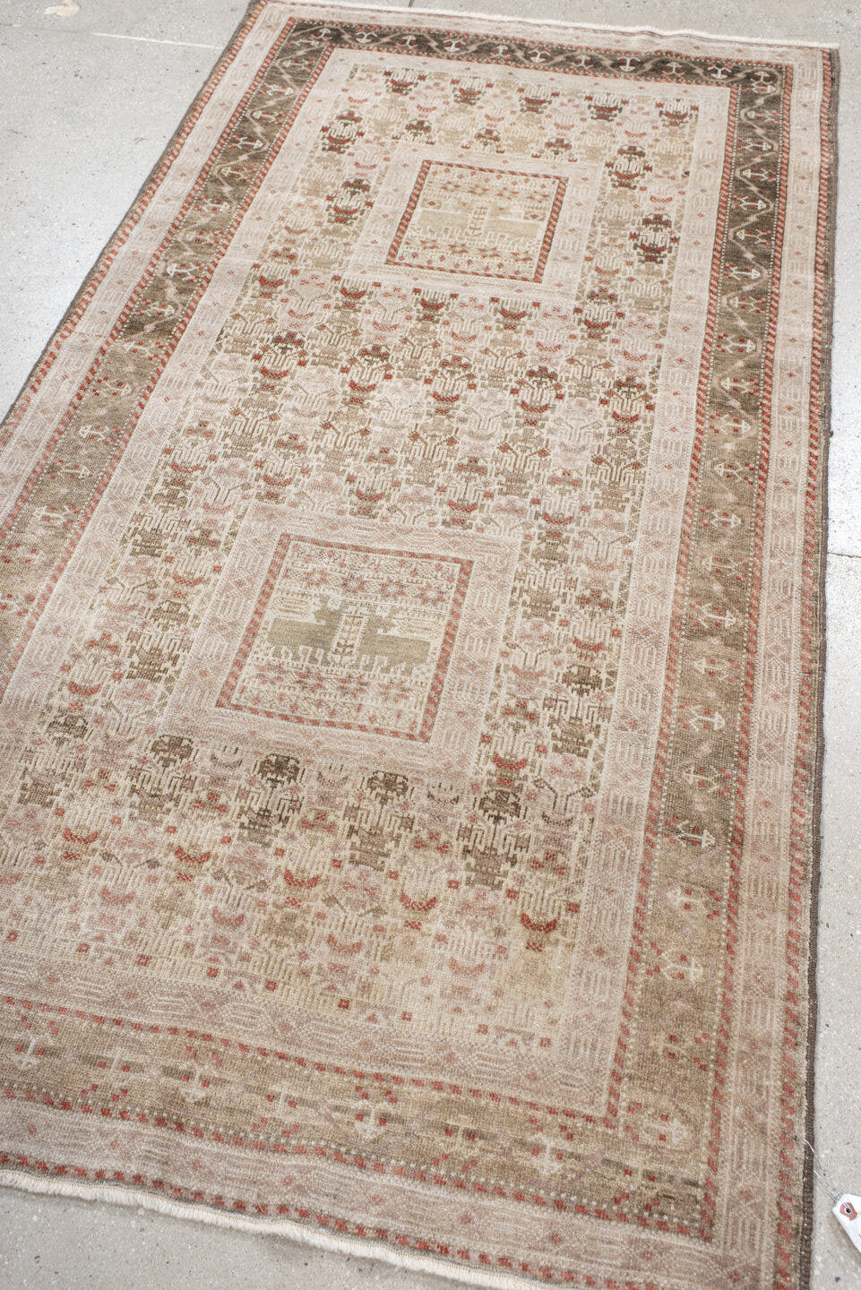 3' x 6' one-of-a-kind handmade vintage Belouch small size rug. Color palette: ivory, taupe, brown, rust, camel, beige, gray