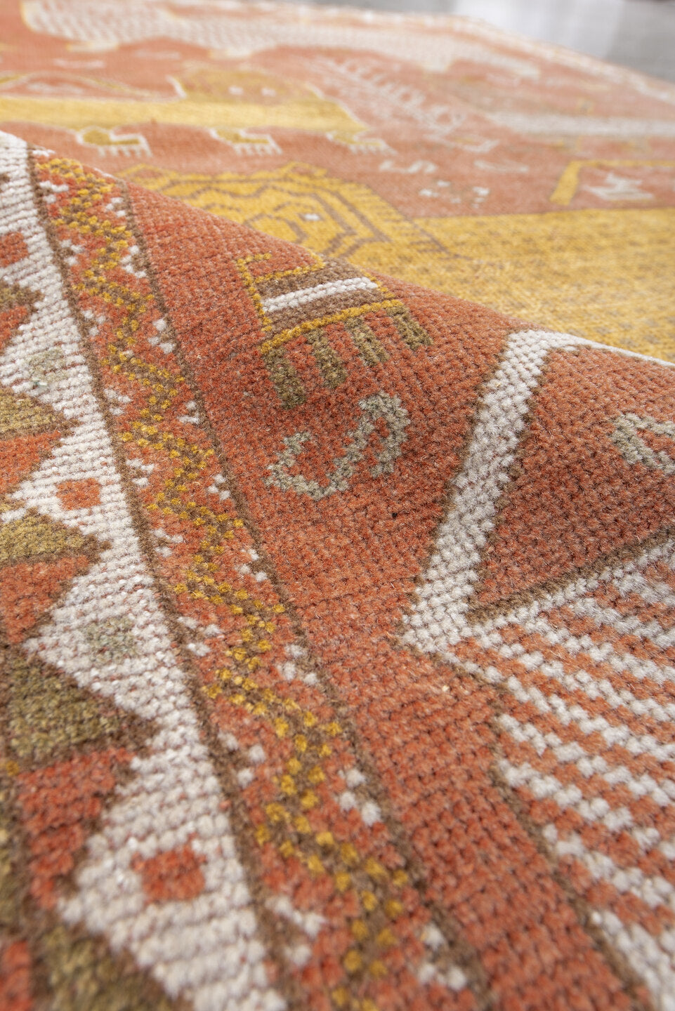 4' x 6' one-of-a-kind handmade vintage Gabbe small size rug. Color palette: brown, gray, light gray, off-white, orange, pink