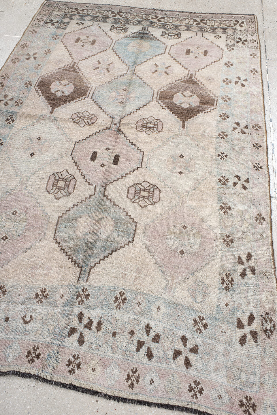 4' x 7' one-of-a-kind handmade vintage Gabbe rug. Color palette: ivory, sky blue, taupe, brown, blush, charcoal, light blue
