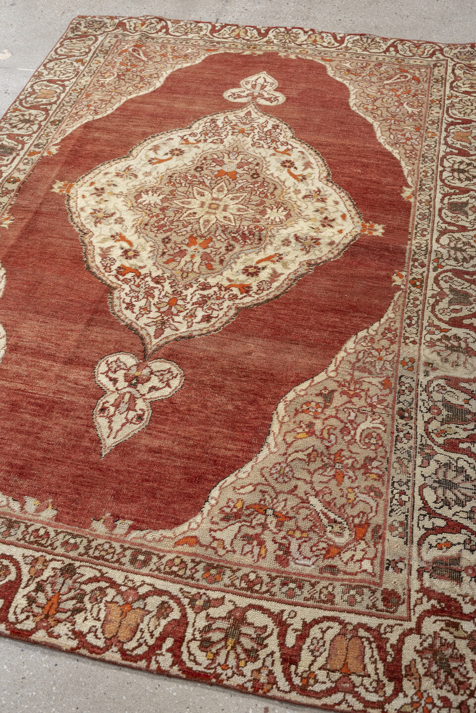 6' x 4' one-of-a-kind handmade antique Anatolian rug. Color palette: terracotta, ivory, rust, taupe, coral, camel, brown
