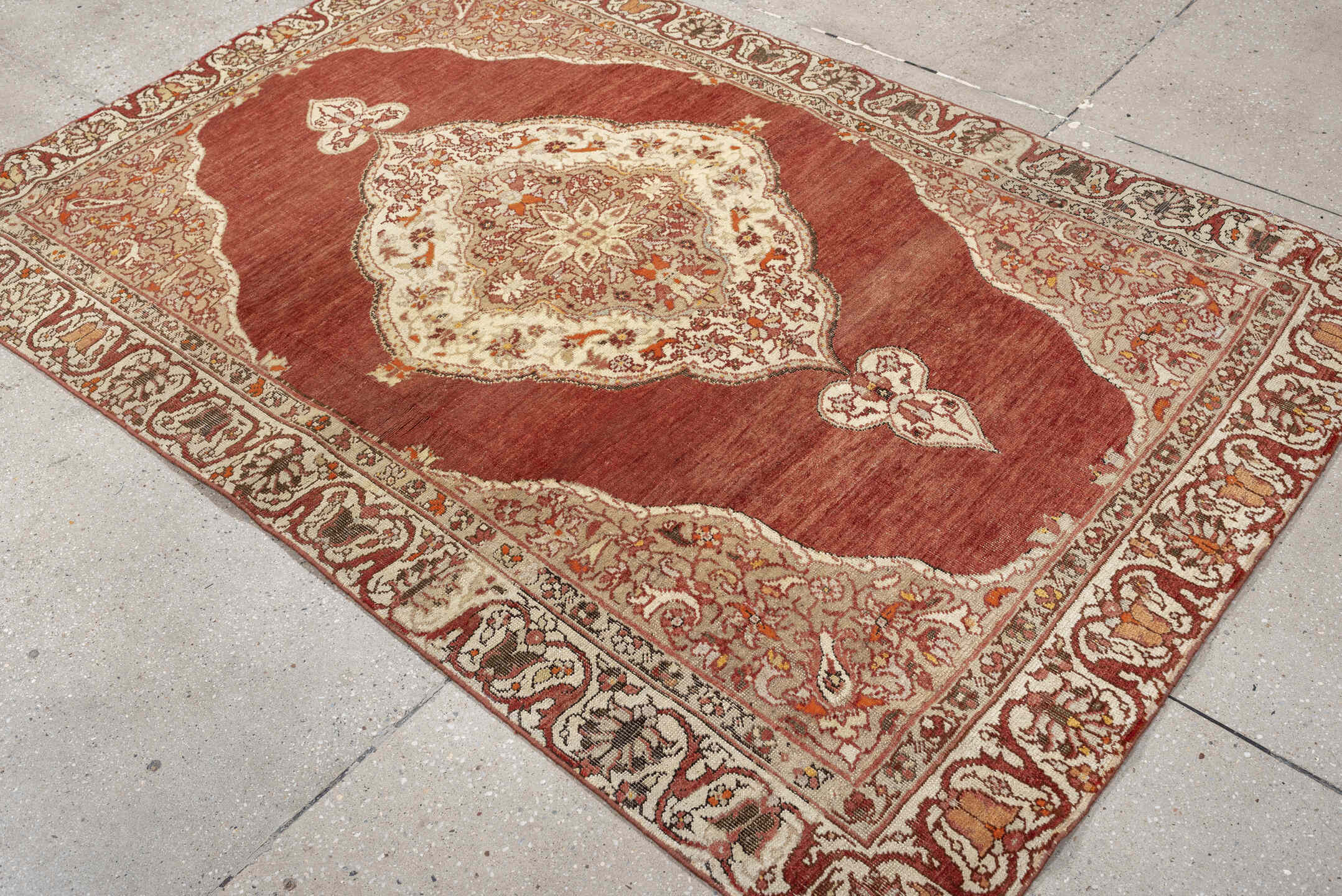6' x 4' one-of-a-kind handmade antique Anatolian rug. Color palette: terracotta, ivory, rust, taupe, coral, camel, brown