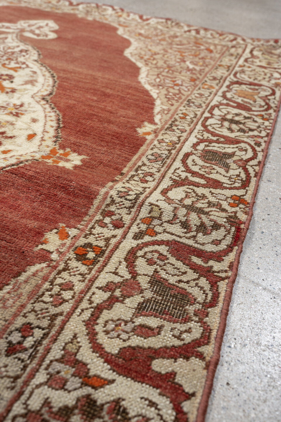 6' x 4' one-of-a-kind handmade antique Anatolian rug. Color palette: terracotta, ivory, rust, taupe, coral, camel, brown