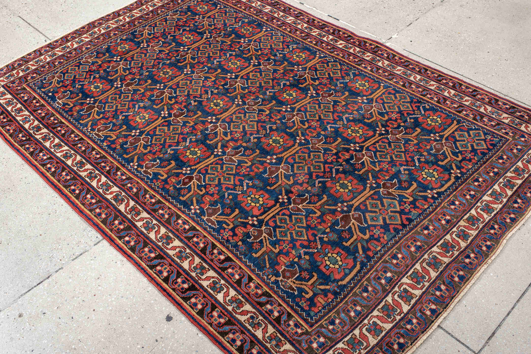 4' x 6' one-of-a-kind handmade antique Afshar small size rug. Color palette: indigo, rust, ivory, navy, camel, sage