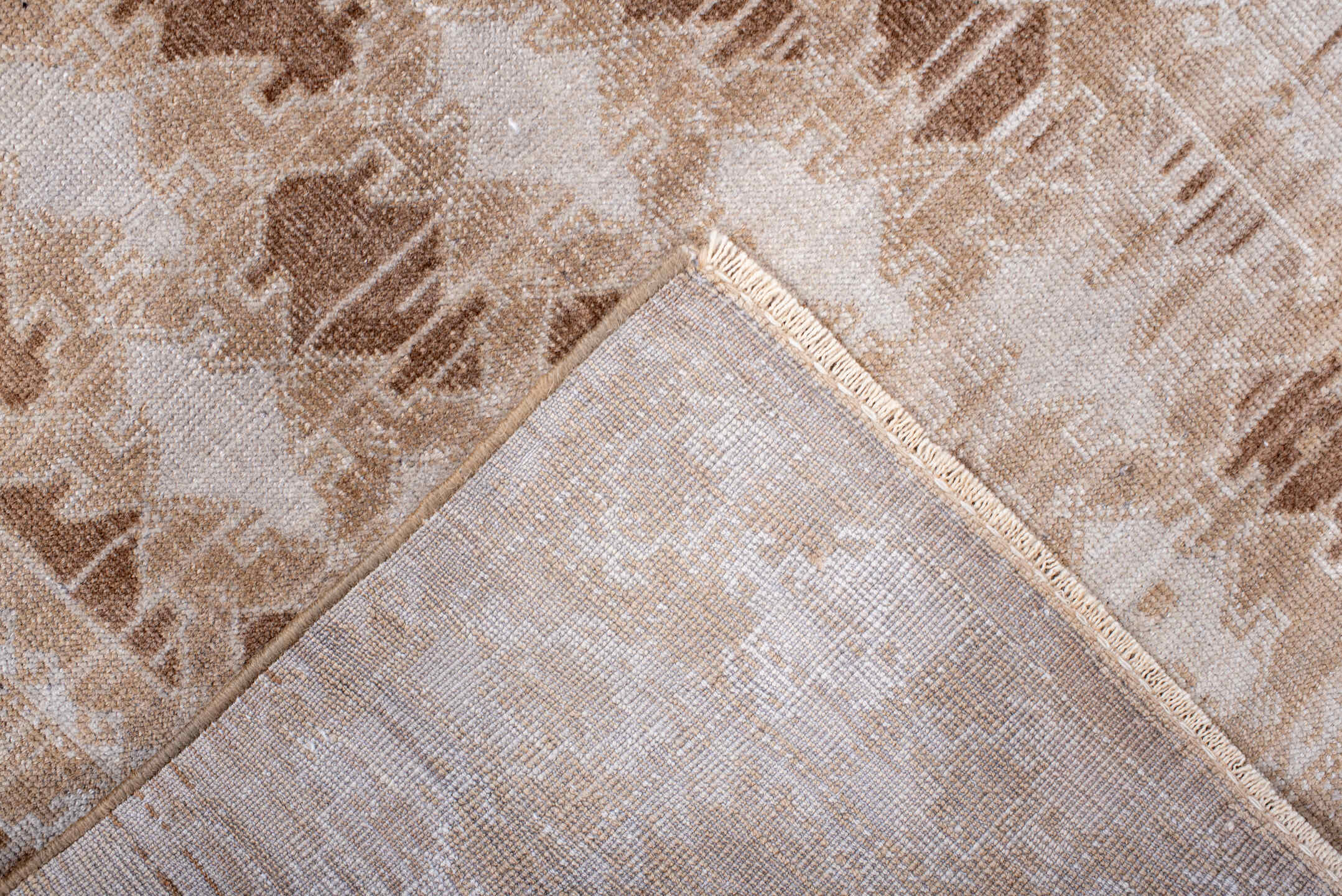 2' x 4' one-of-a-kind handmade antique Belouch small size rug. Color palette: ivory, camel, taupe, beige, gray