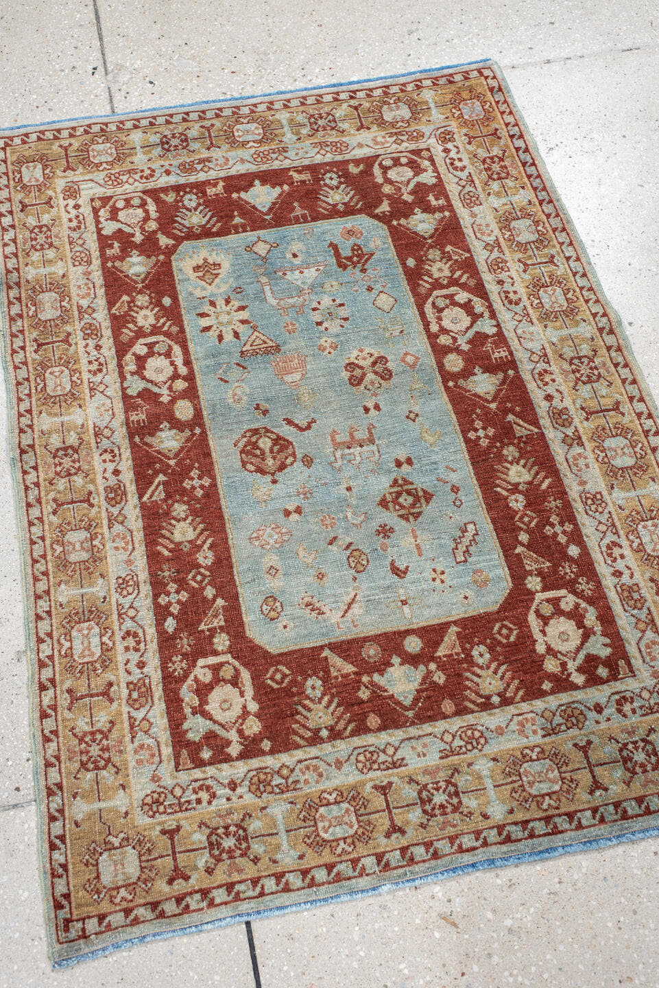 2' x 3' one-of-a-kind handmade antique Qashqai small size rug. Color palette: rust, light blue, ivory, camel, taupe
