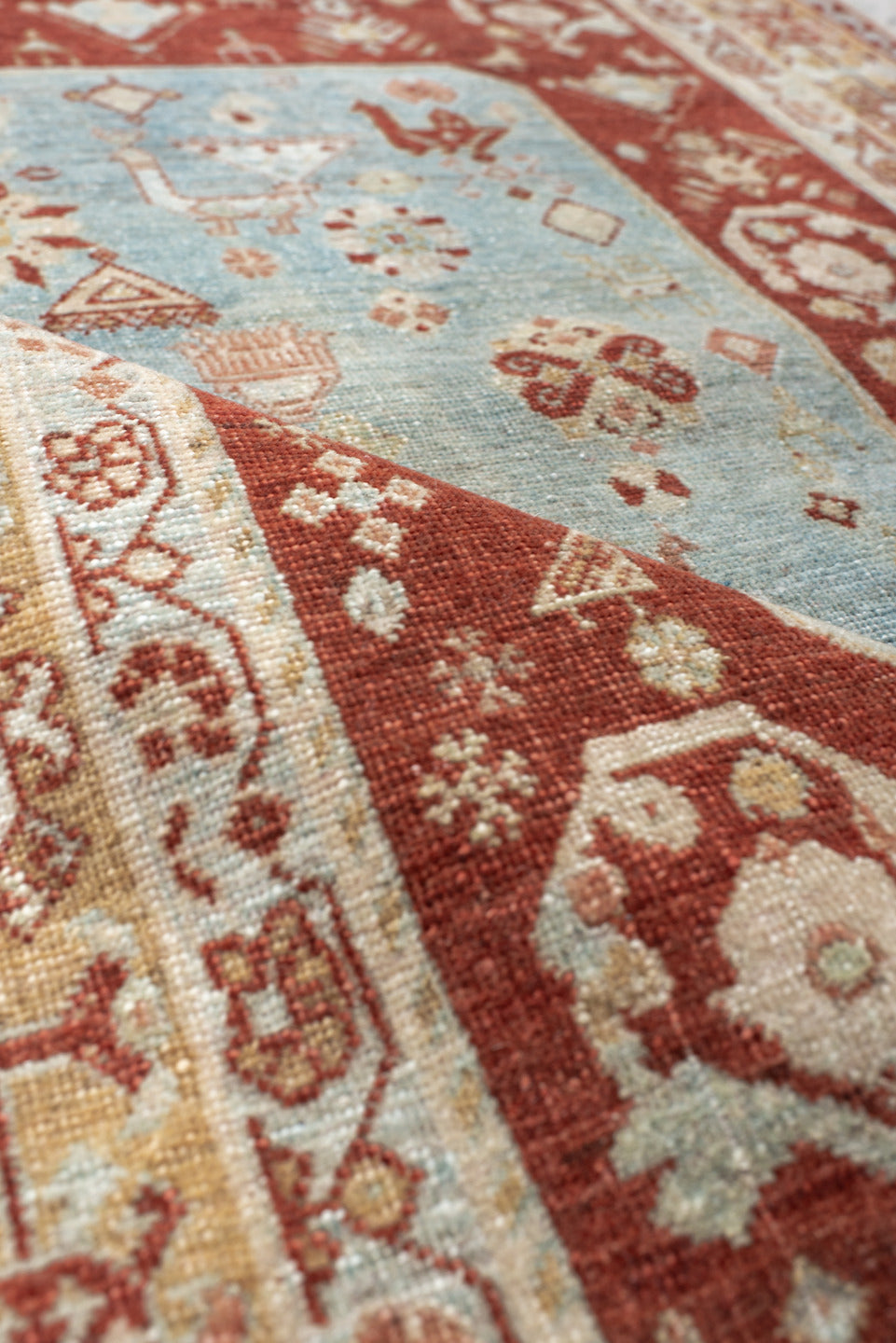 2' x 3' one-of-a-kind handmade antique Qashqai small size rug. Color palette: rust, light blue, ivory, camel, taupe