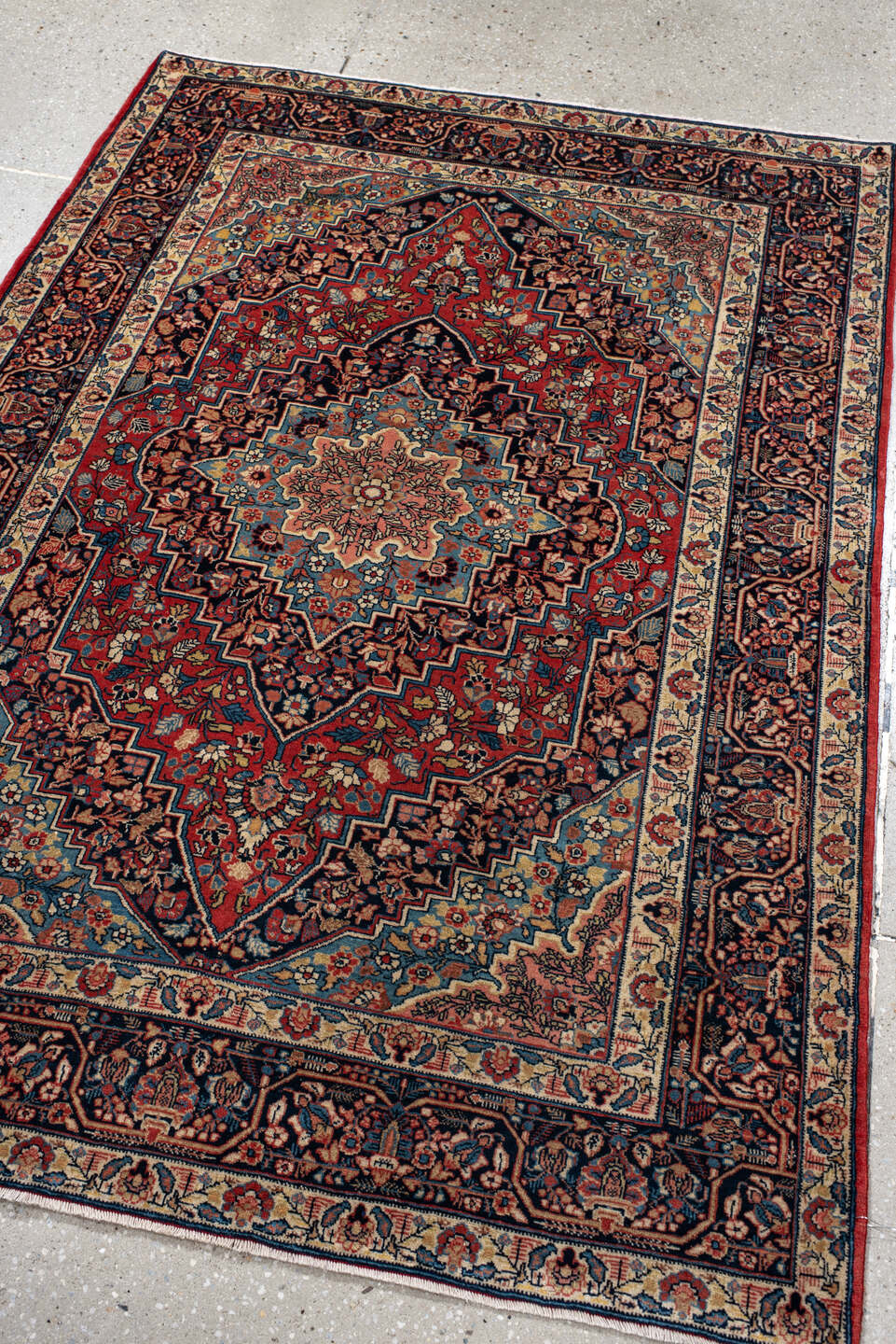 4' x 5' one-of-a-kind handmade antique Kashan small size rug. Color palette: navy, rust, ivory, sky_blue, rose, camel