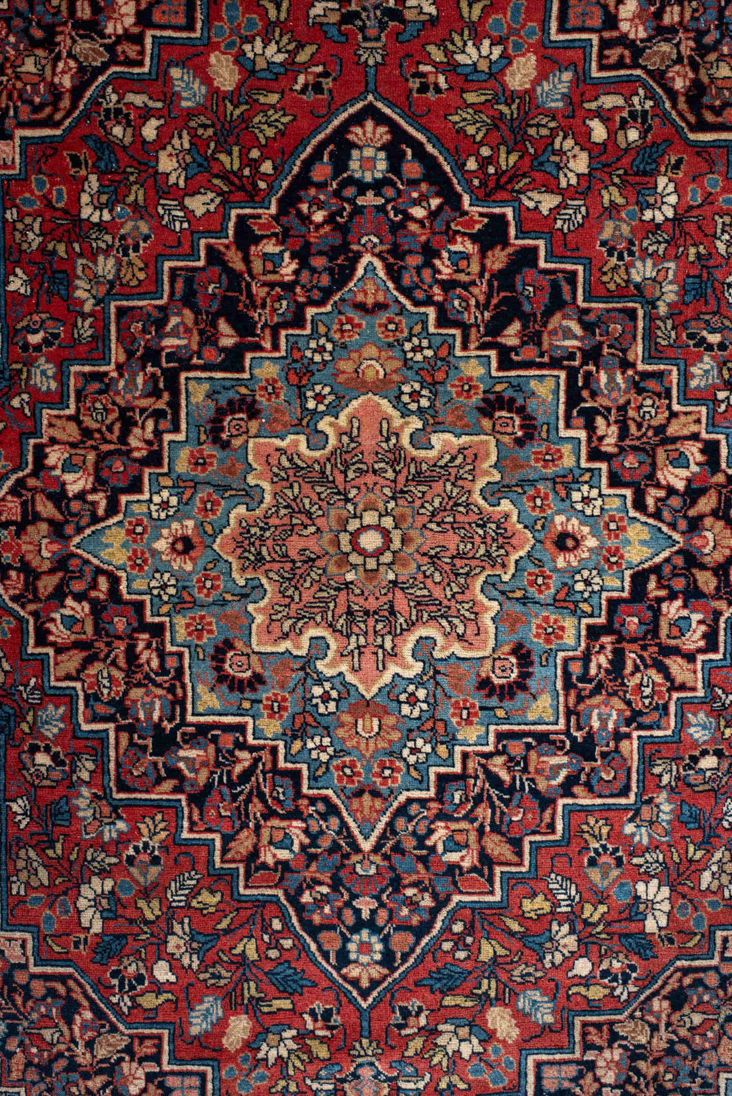 4' x 5' one-of-a-kind handmade antique Kashan small size rug. Color palette: navy, rust, ivory, sky_blue, rose, camel