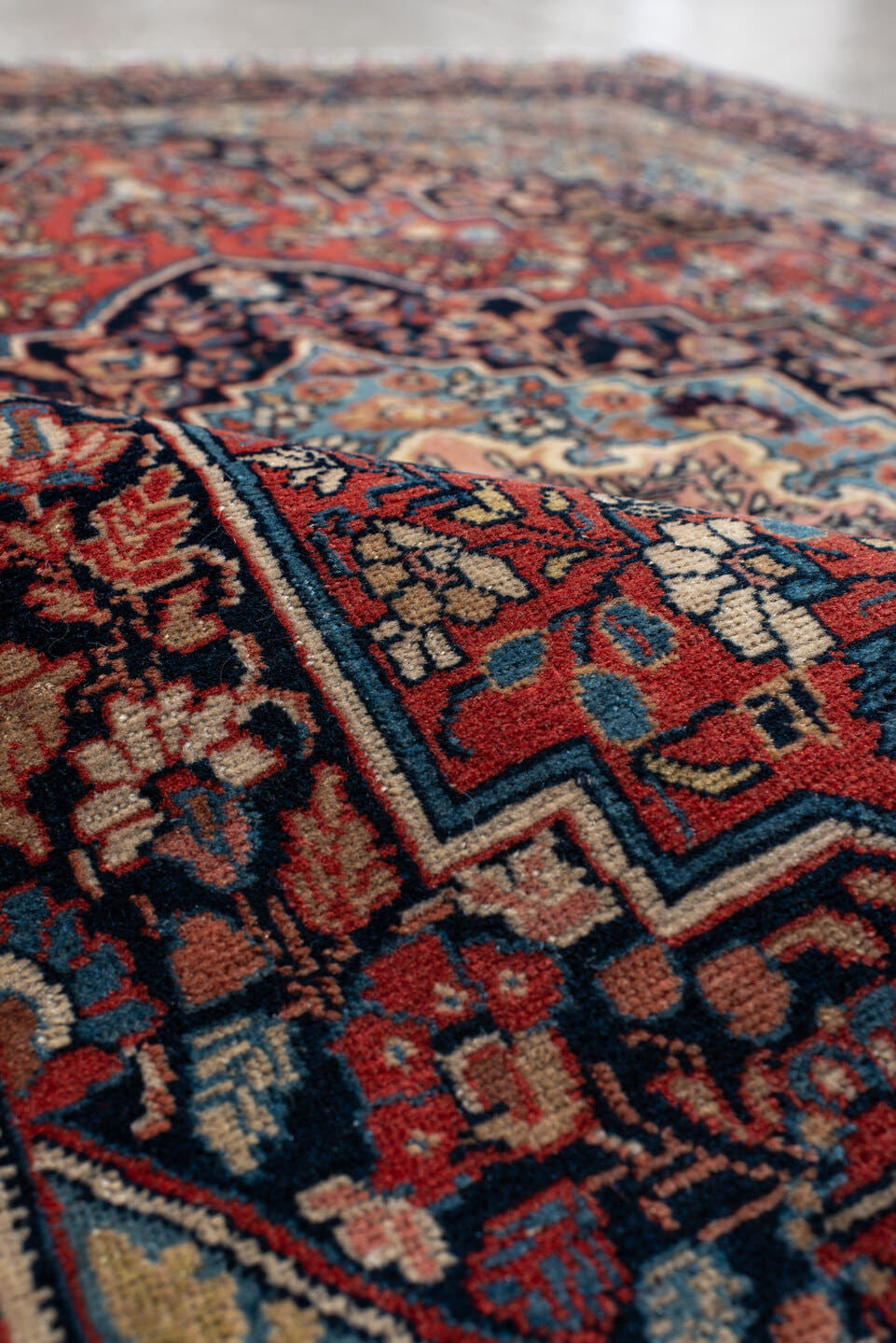 4' x 5' one-of-a-kind handmade antique Kashan small size rug. Color palette: navy, rust, ivory, sky_blue, rose, camel