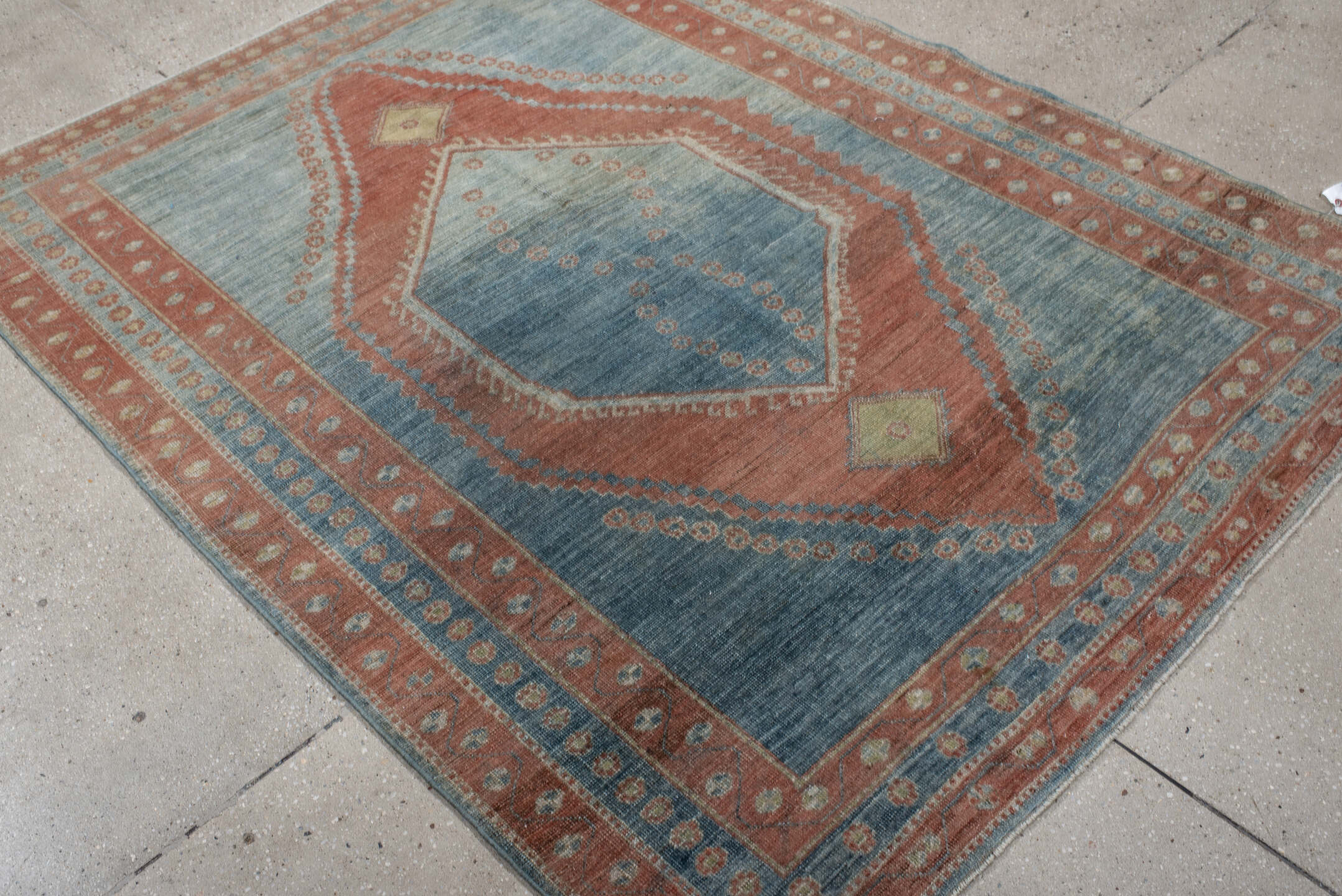 5' x 6' one-of-a-kind handmade antique Gabbe rug. Color palette: blue, terra cotta, ivory, sage, slate, terracotta, brown